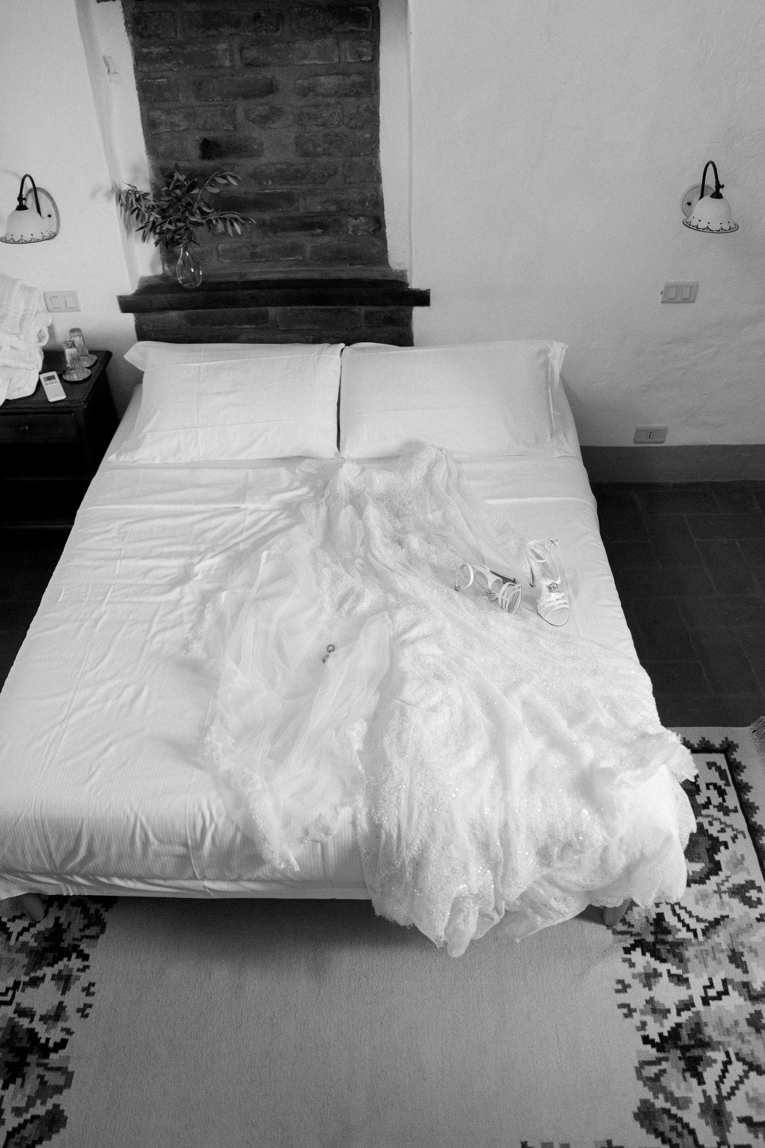 Series of black and white photos showing unmade white bedding in a rustic room.