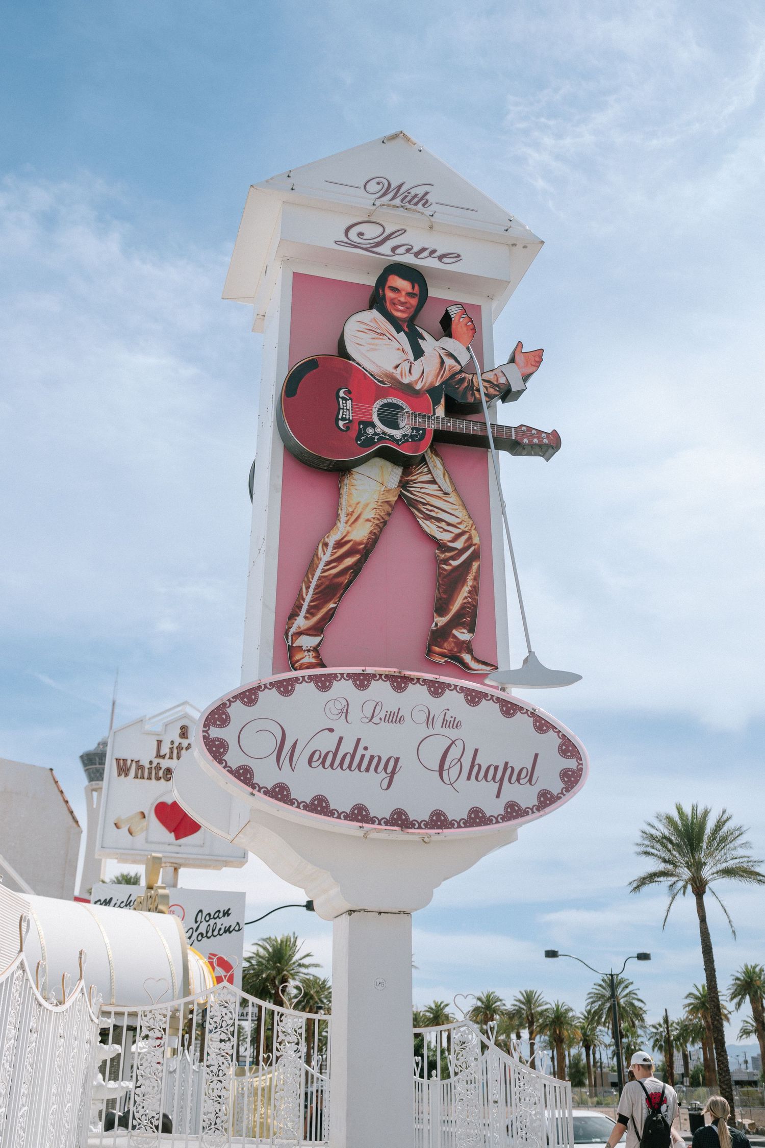 Iconic Little White Wedding Chapel sign with Elvis figure in Las Vegas.