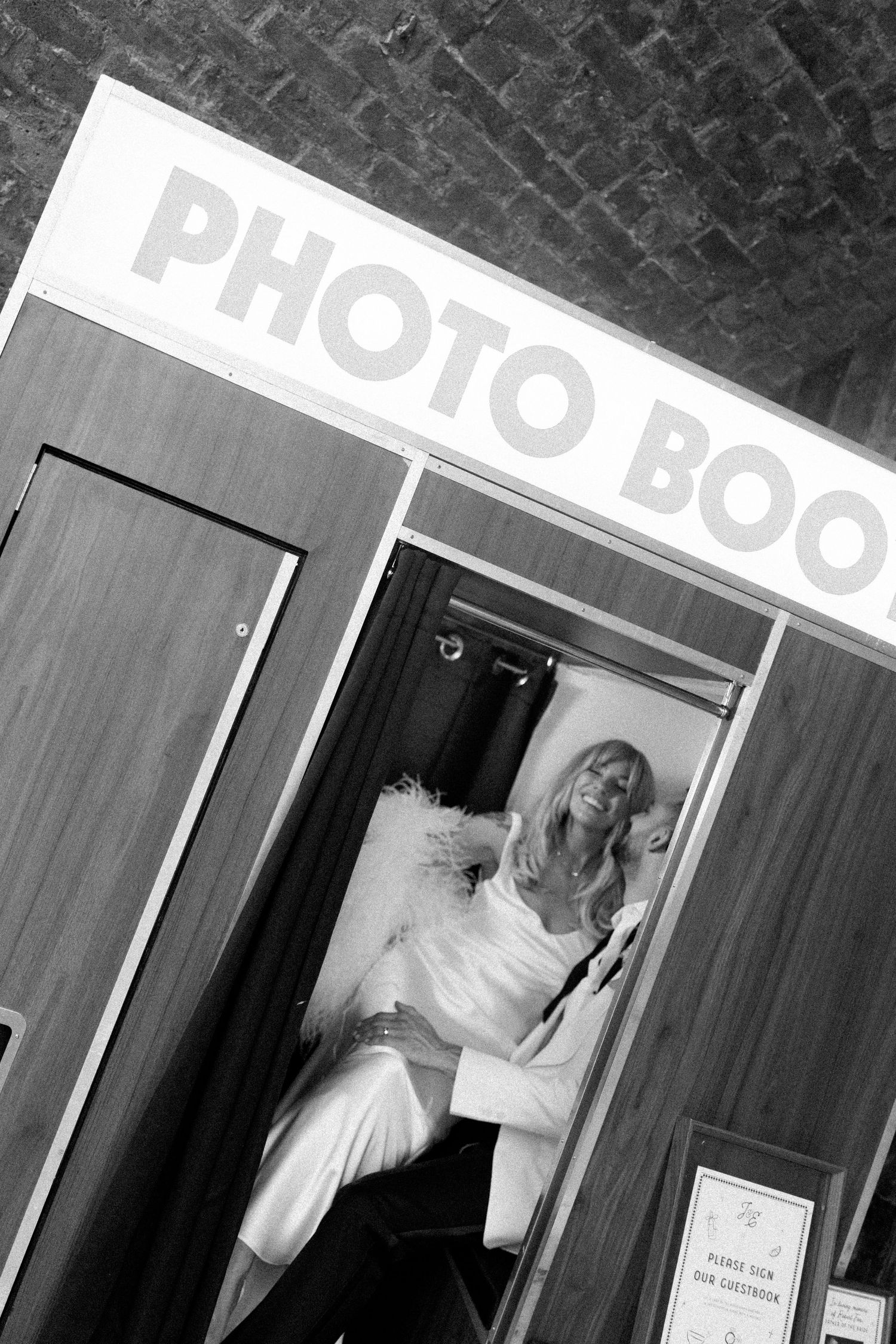 Sequence of photo booth shots showing people posing in a vintage-style booth.