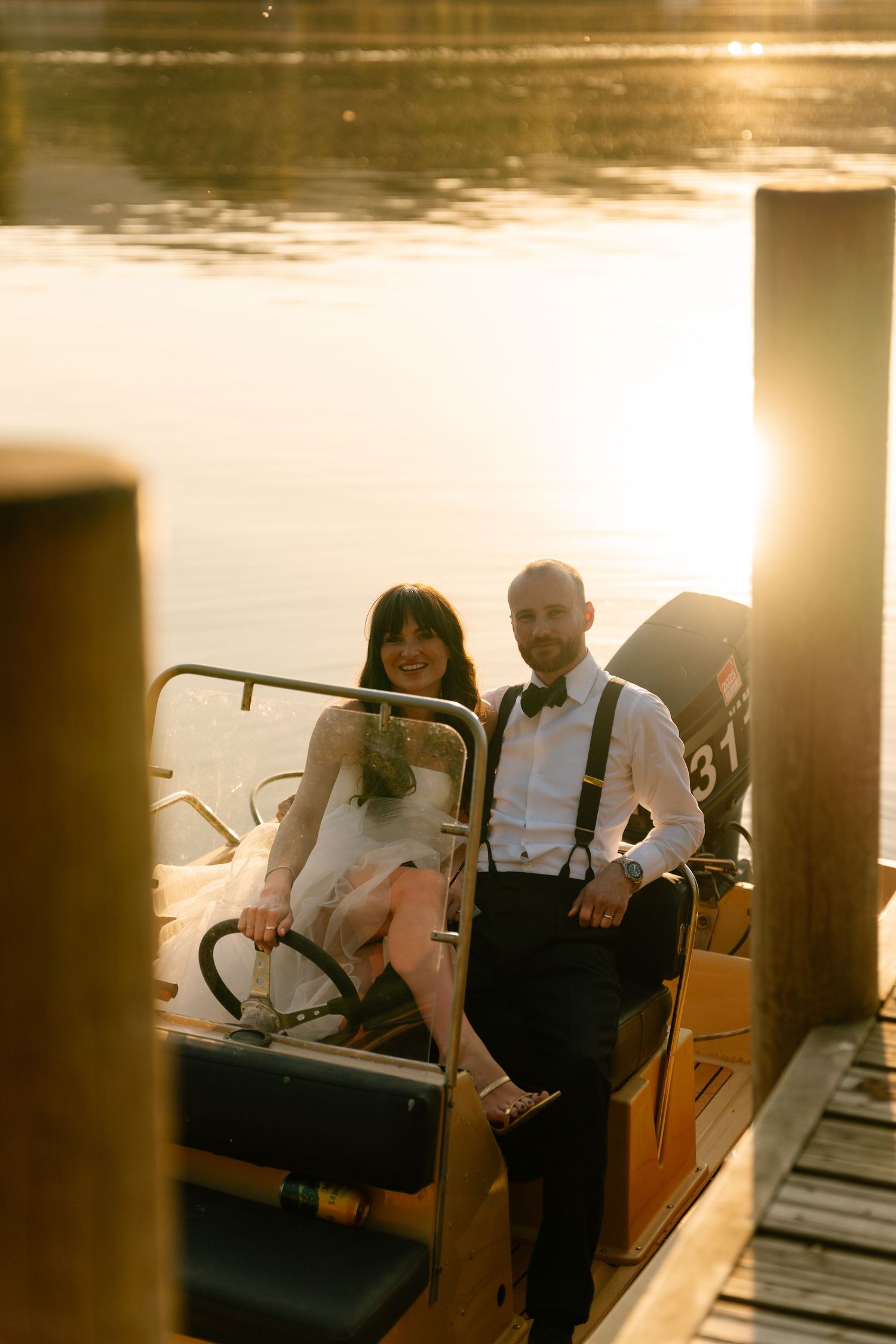 Sunset wedding photoshoot sequence on boat dock with golden light reflecting on water.