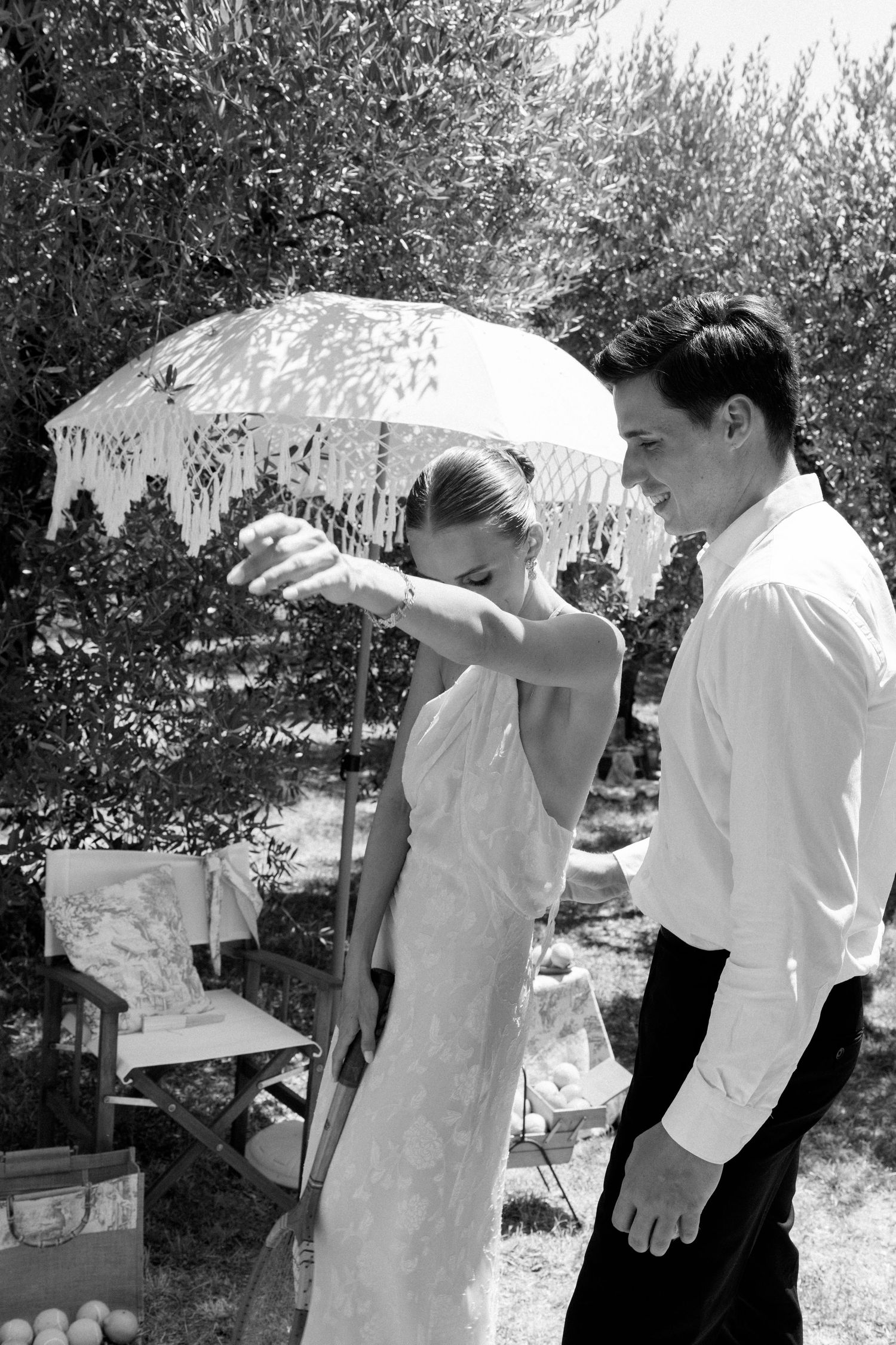 A series of black and white photos showing people drinking from glasses outdoors.