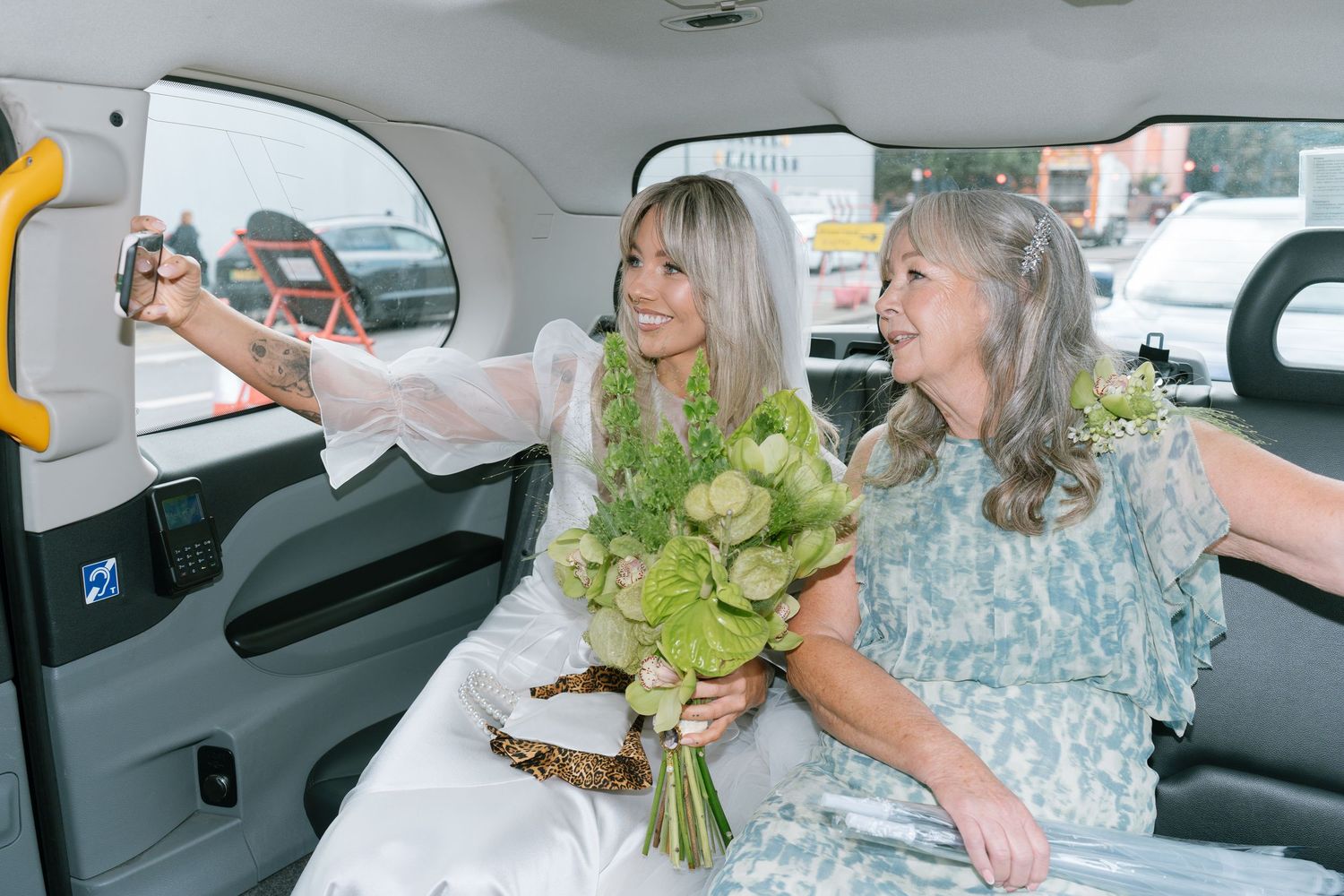 Series of candid moments captured in a car with floral bouquets and natural lighting.