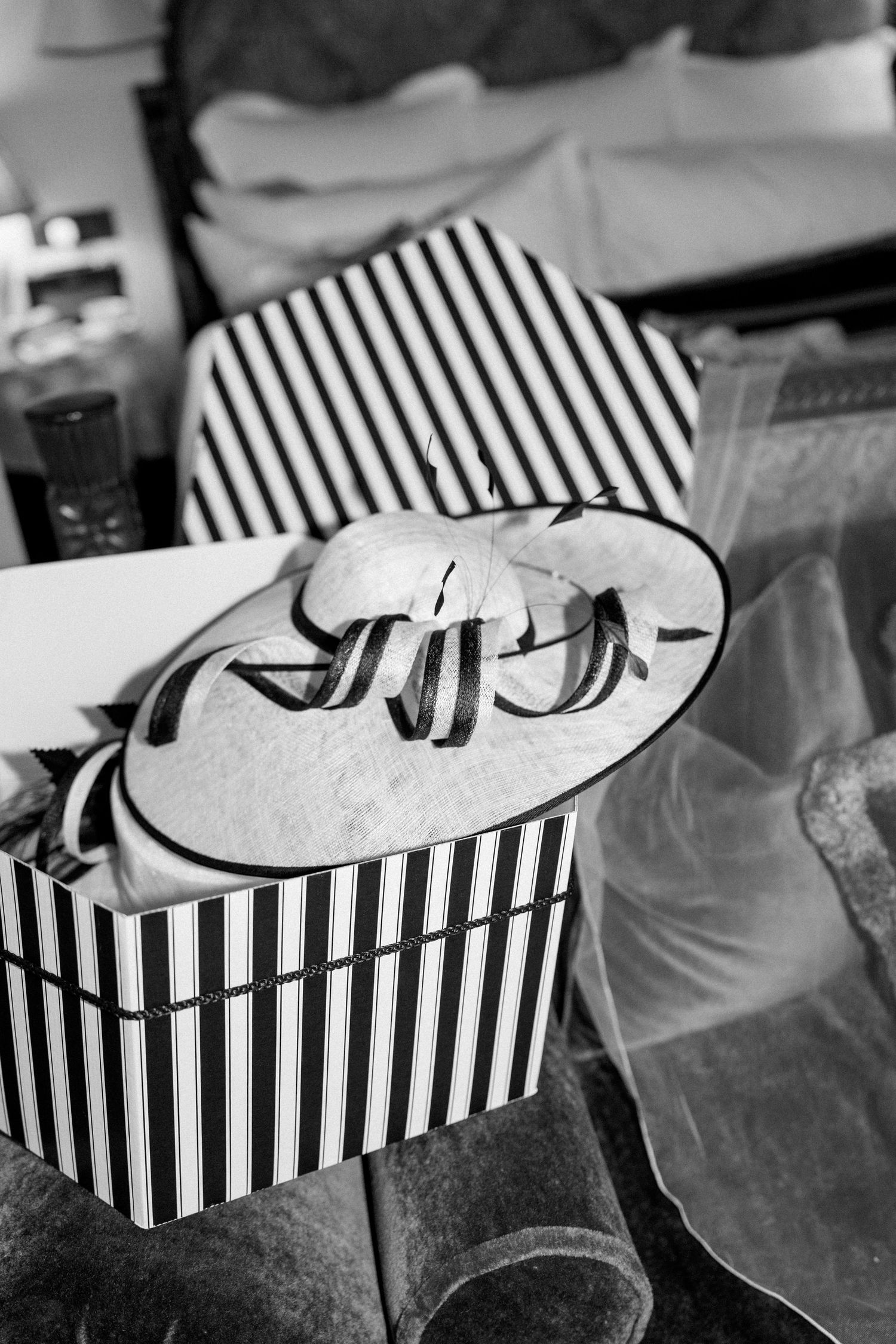 Black and white striped gift boxes arranged in a row.