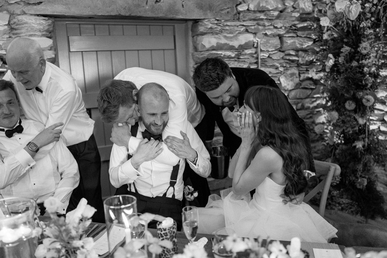 Candid moments of celebration and laughter at a rustic wedding reception.