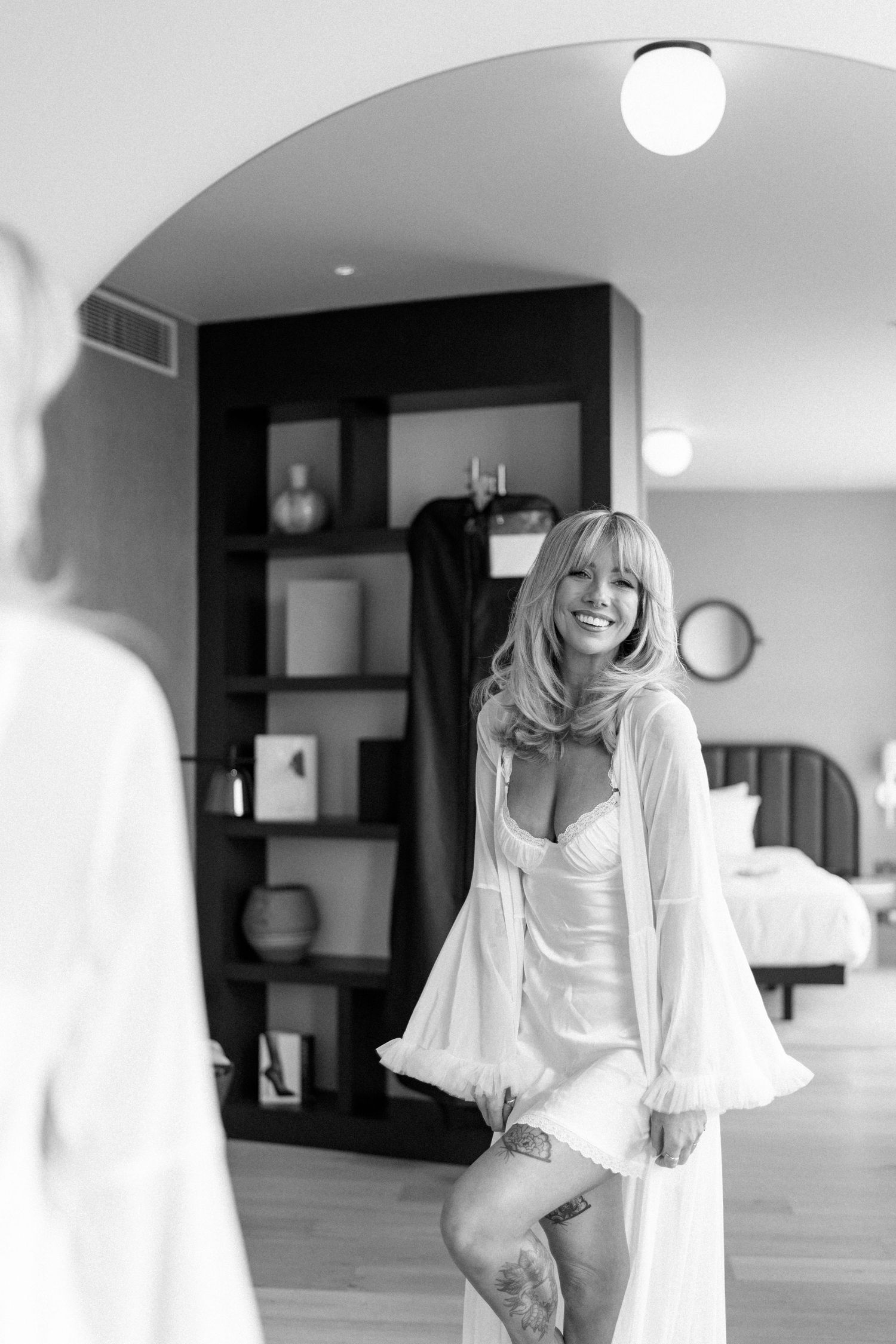 Black and white candid shots showing joyful moments in a bright interior space.