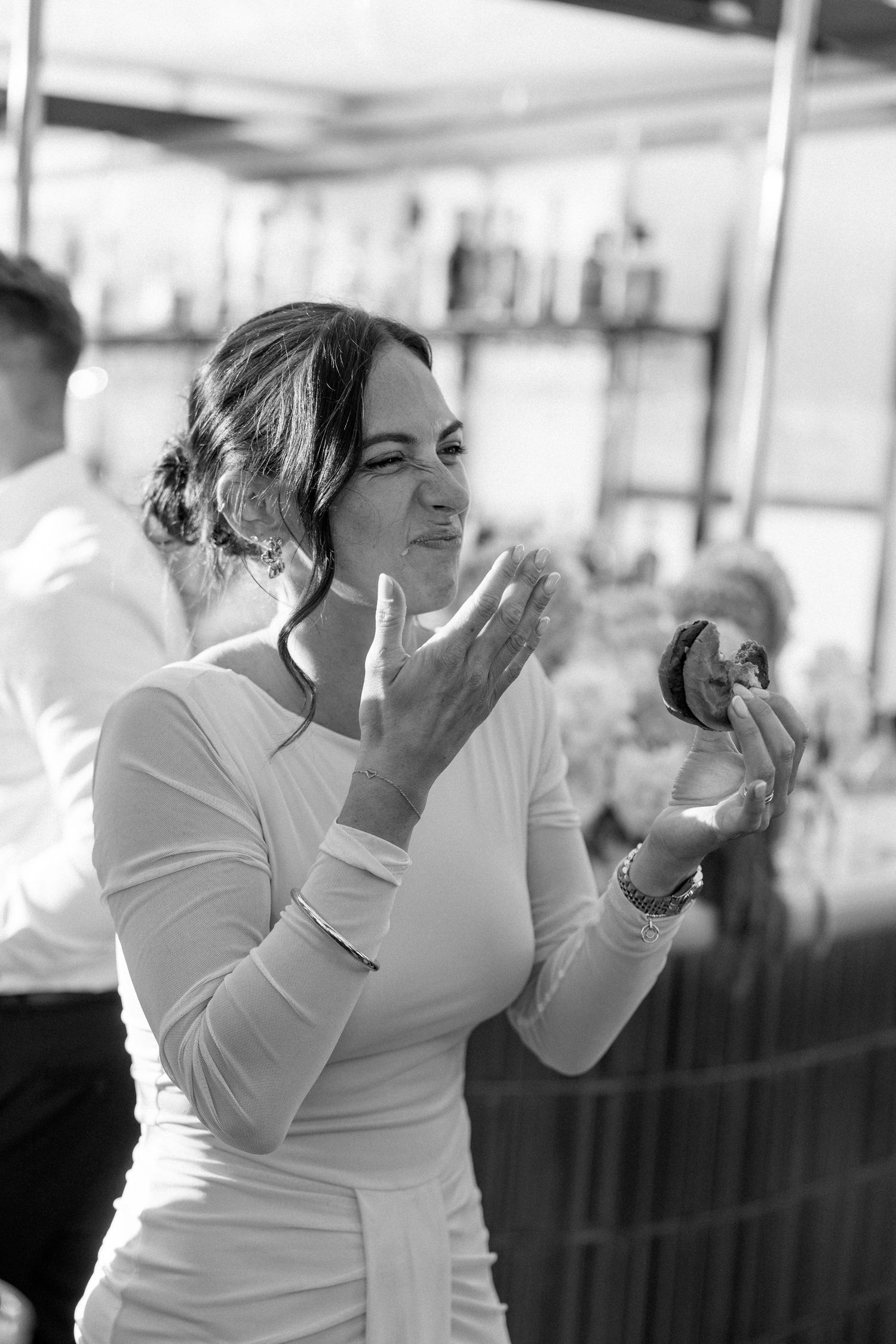 Black and white sequence of emotional reactions during a wedding celebration.