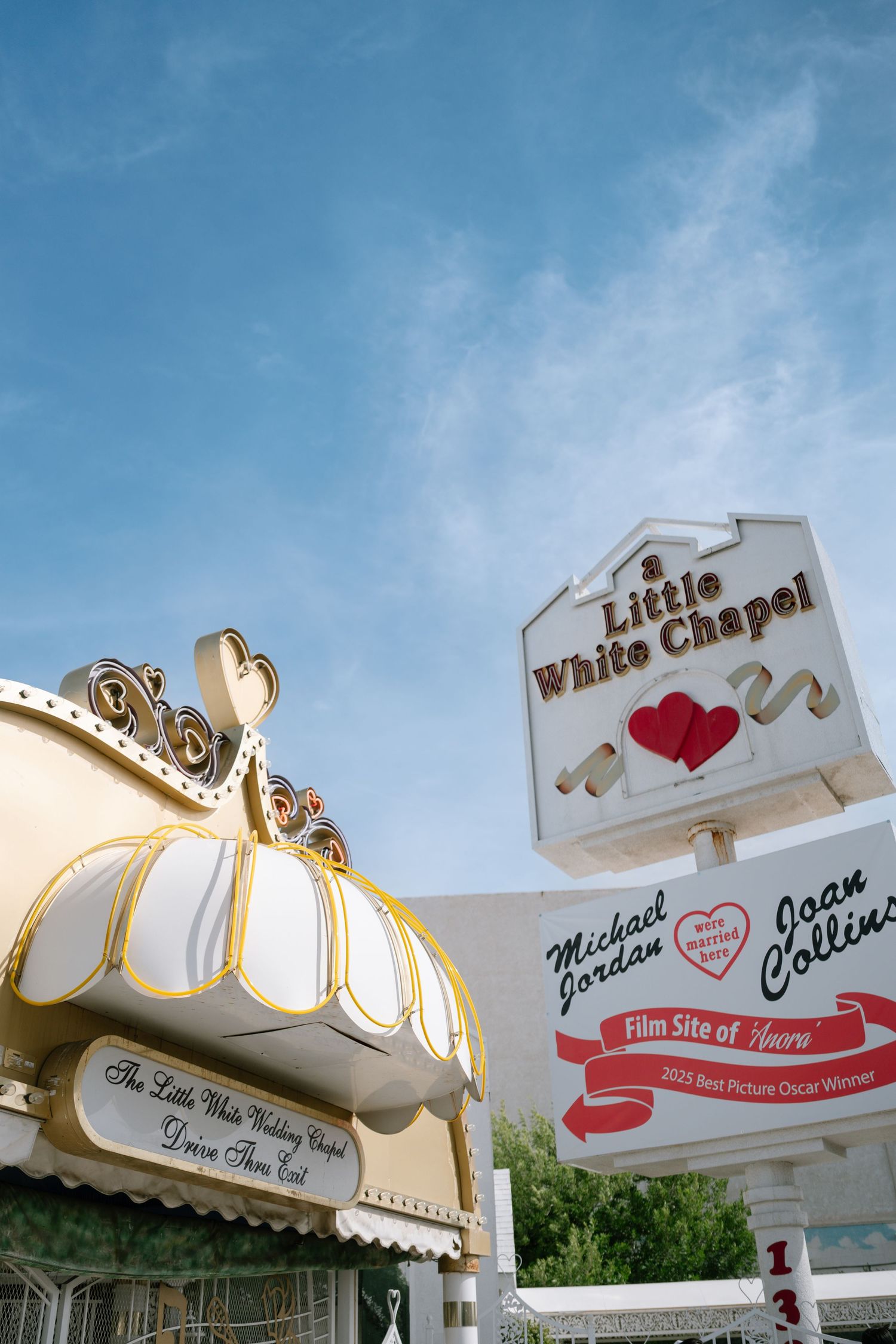 Series of vintage Las Vegas wedding chapel signs with retro typography and hearts.