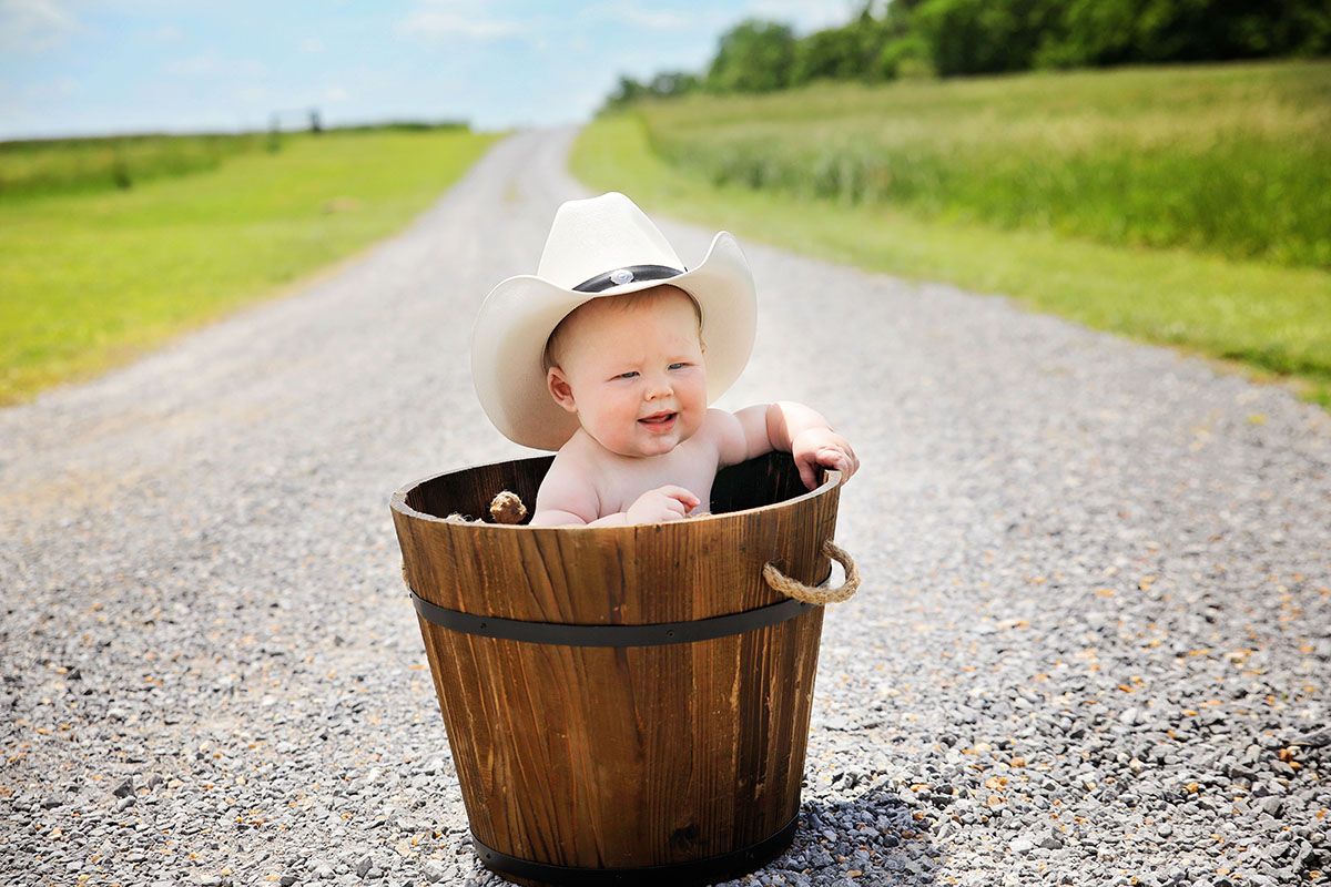 imagination photography rustic baby in barrel