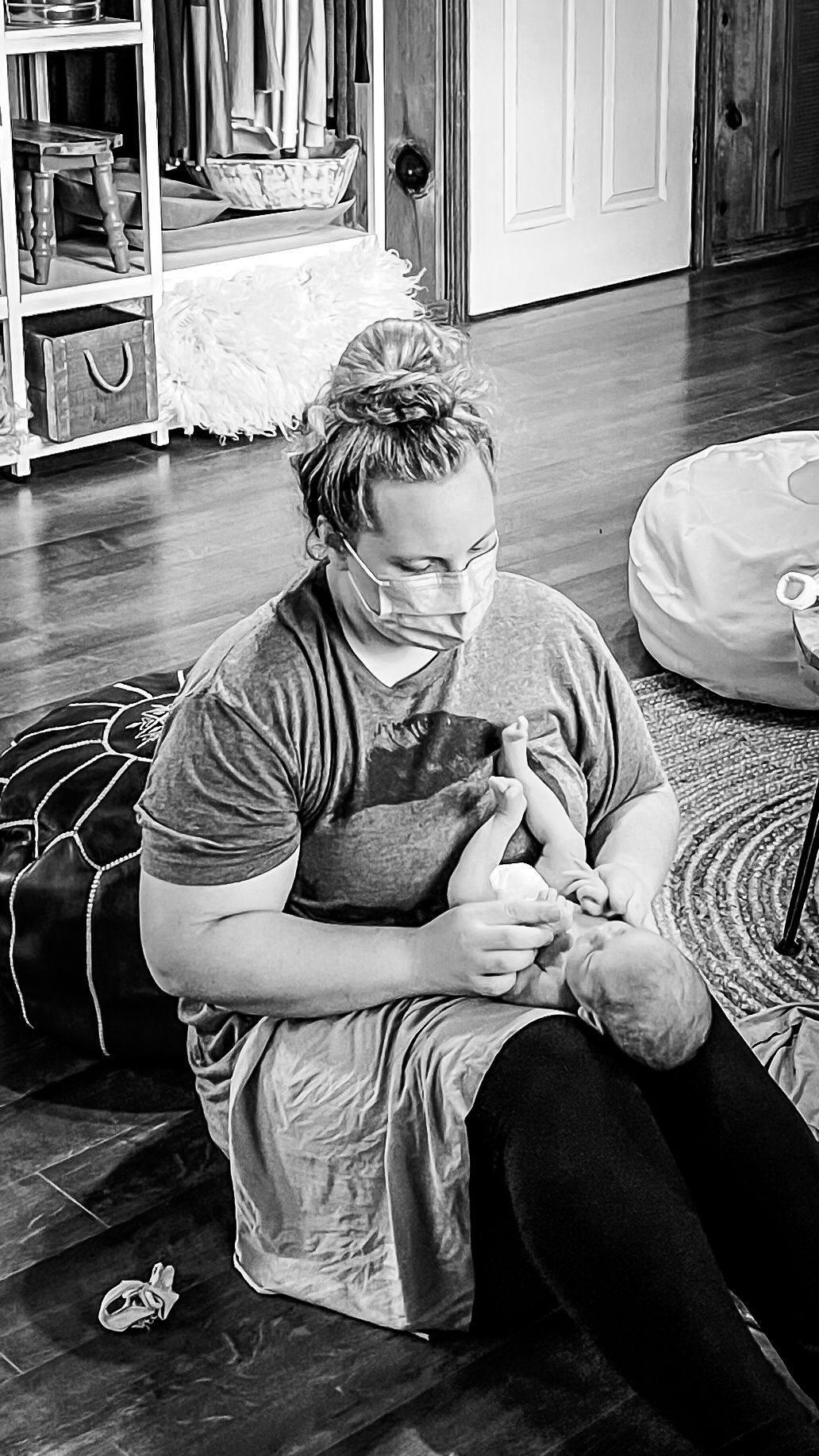 Black and white photo sequence showing someone stretching on hardwood floor.
