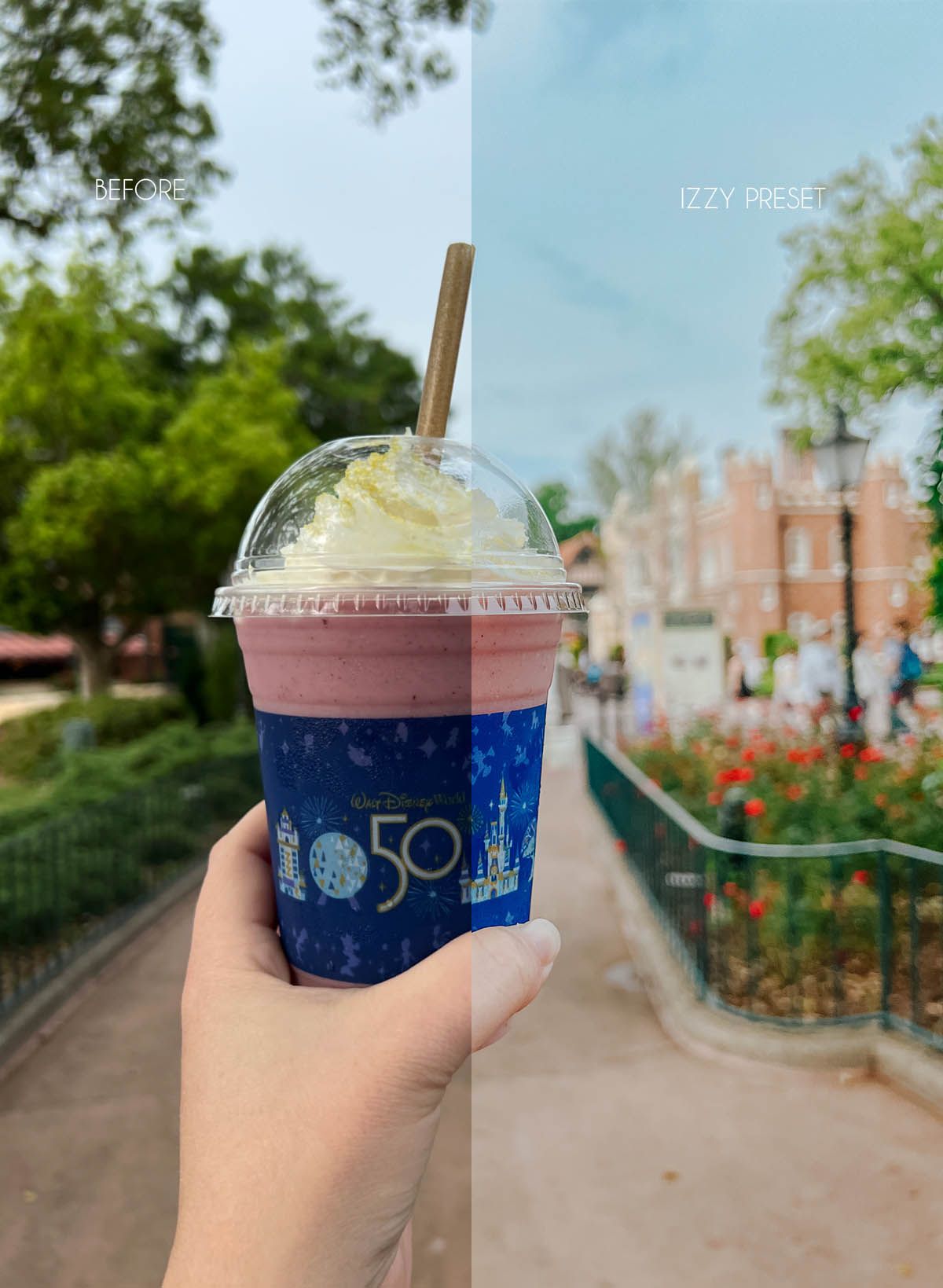 A hand holds a blue frozen drink cup with whipped cream on top against a blurred outdoor background.