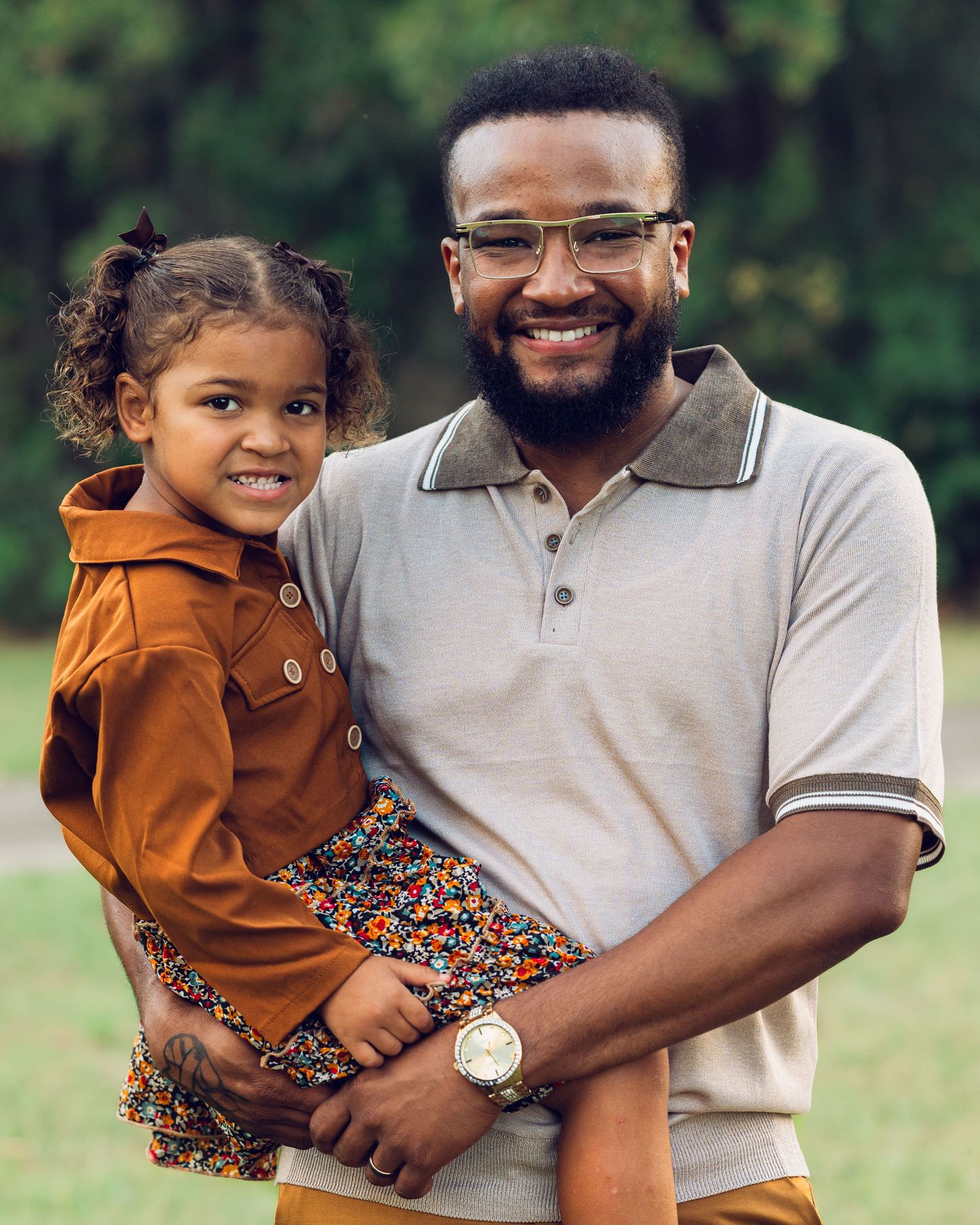 An outdoor portrait showing warmth and happiness between two people.