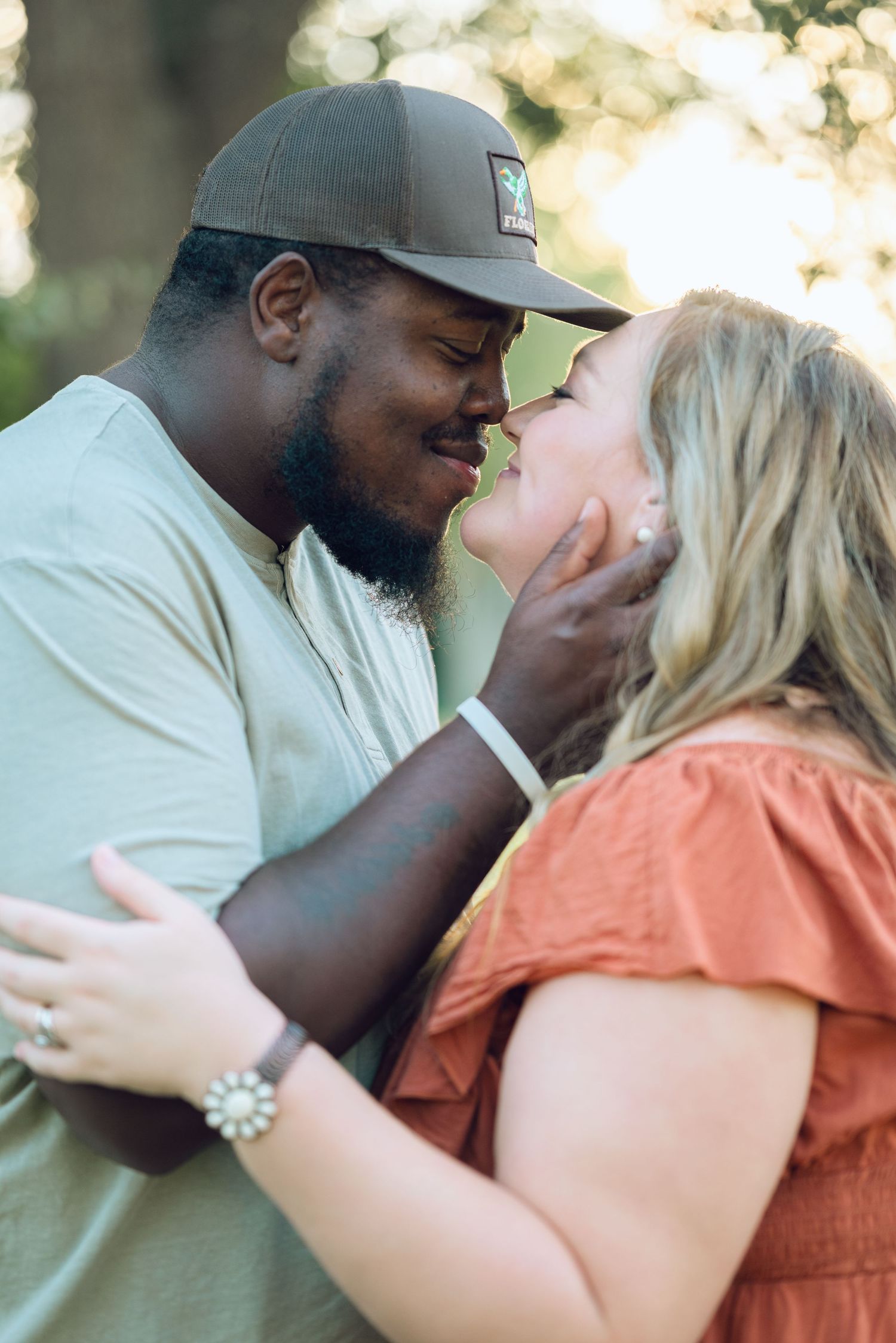 Romantic couple sharing tender moments in a series of intimate photos at sunset.