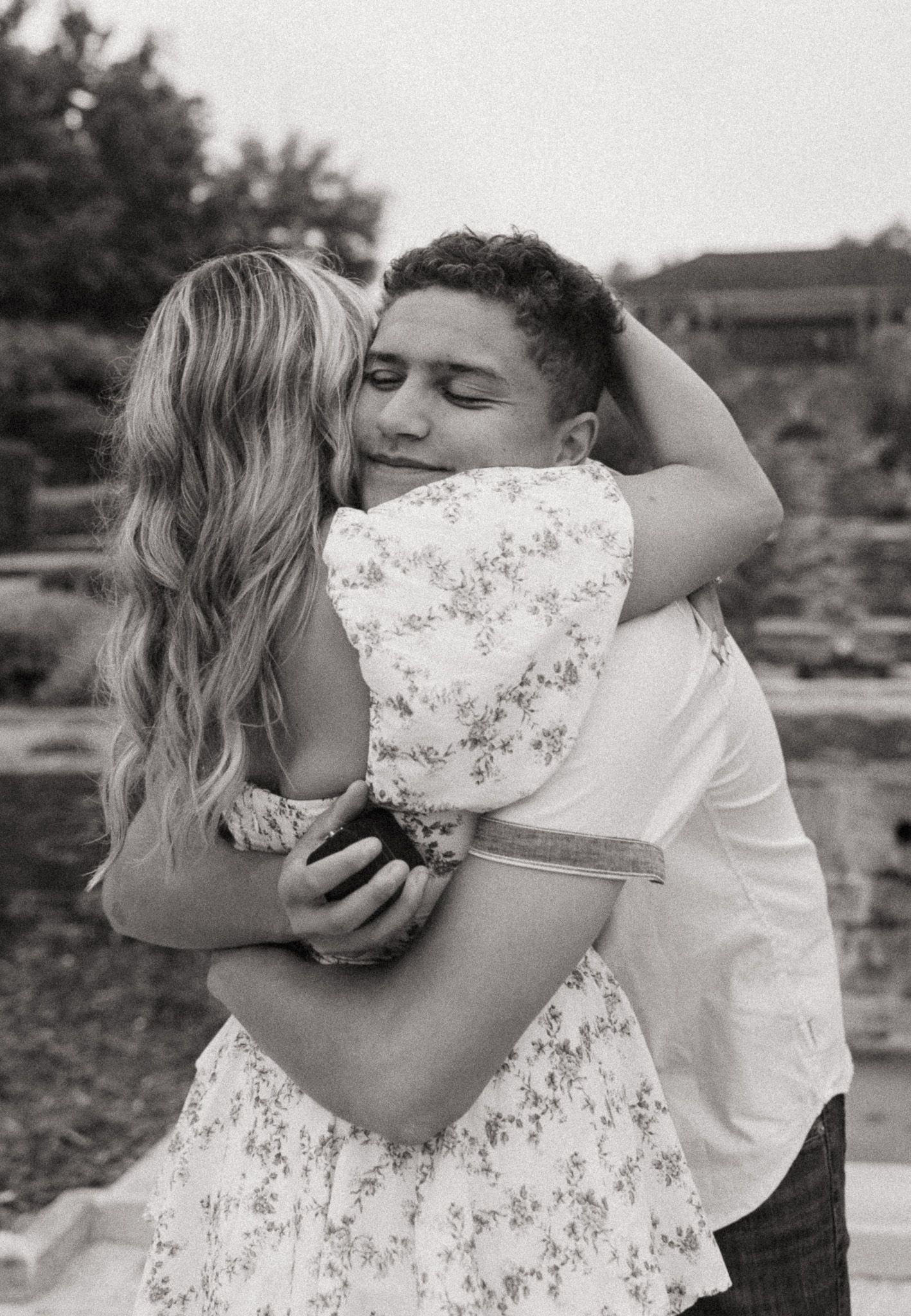 A romantic black and white photo sequence shows a couple embracing while wearing face masks during the pandemic.