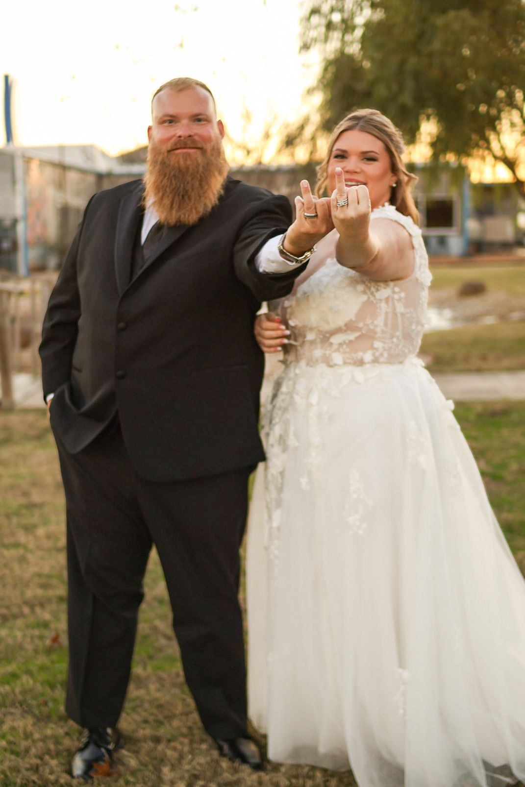 Modern bride and groom photo with romantic golden hour lighting