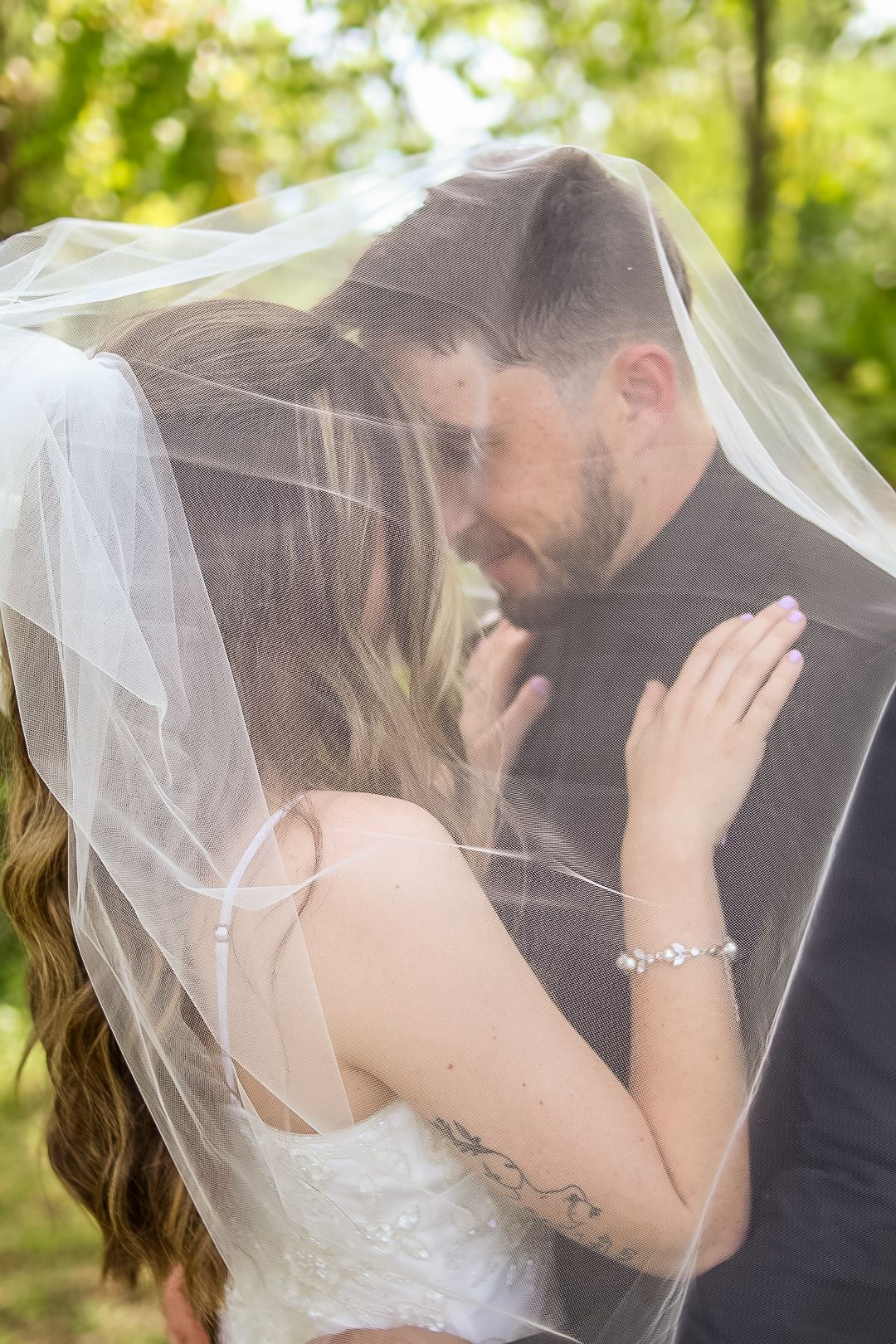 Modern bride and groom photo with romantic golden hour lighting