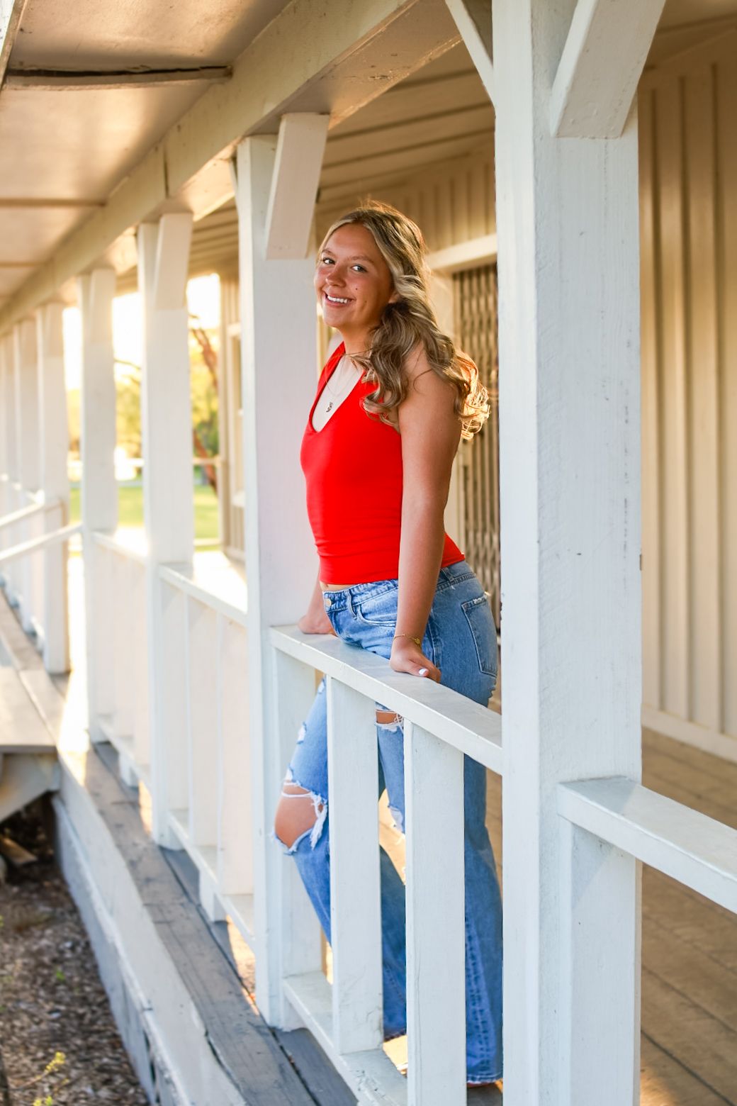 Senior graduation portrait with cap and gown, Perry Posed photography, Dallas–Fort Worth