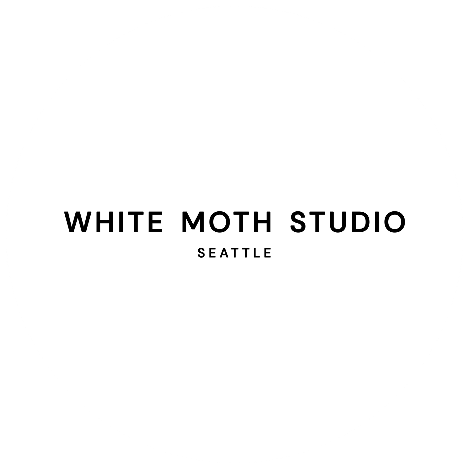 White Moth Studio Seattle minimalist logo in bold black sans-serif typography on a clean white background.