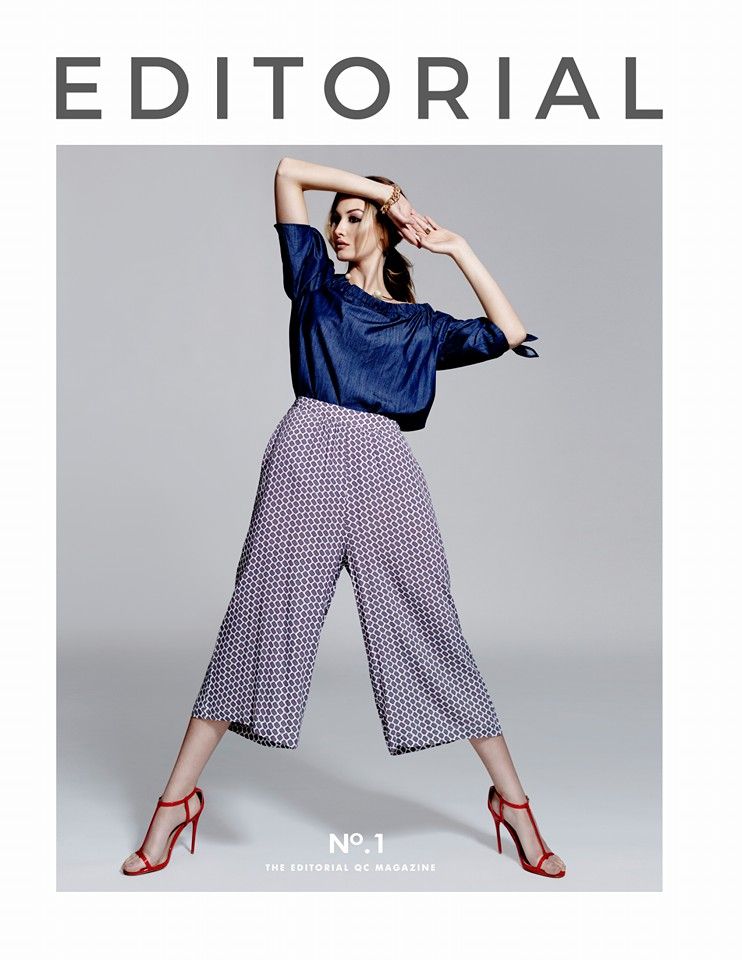 Editorial magazine No.1 cover with model in blue top, wide-leg pants, and red heels.