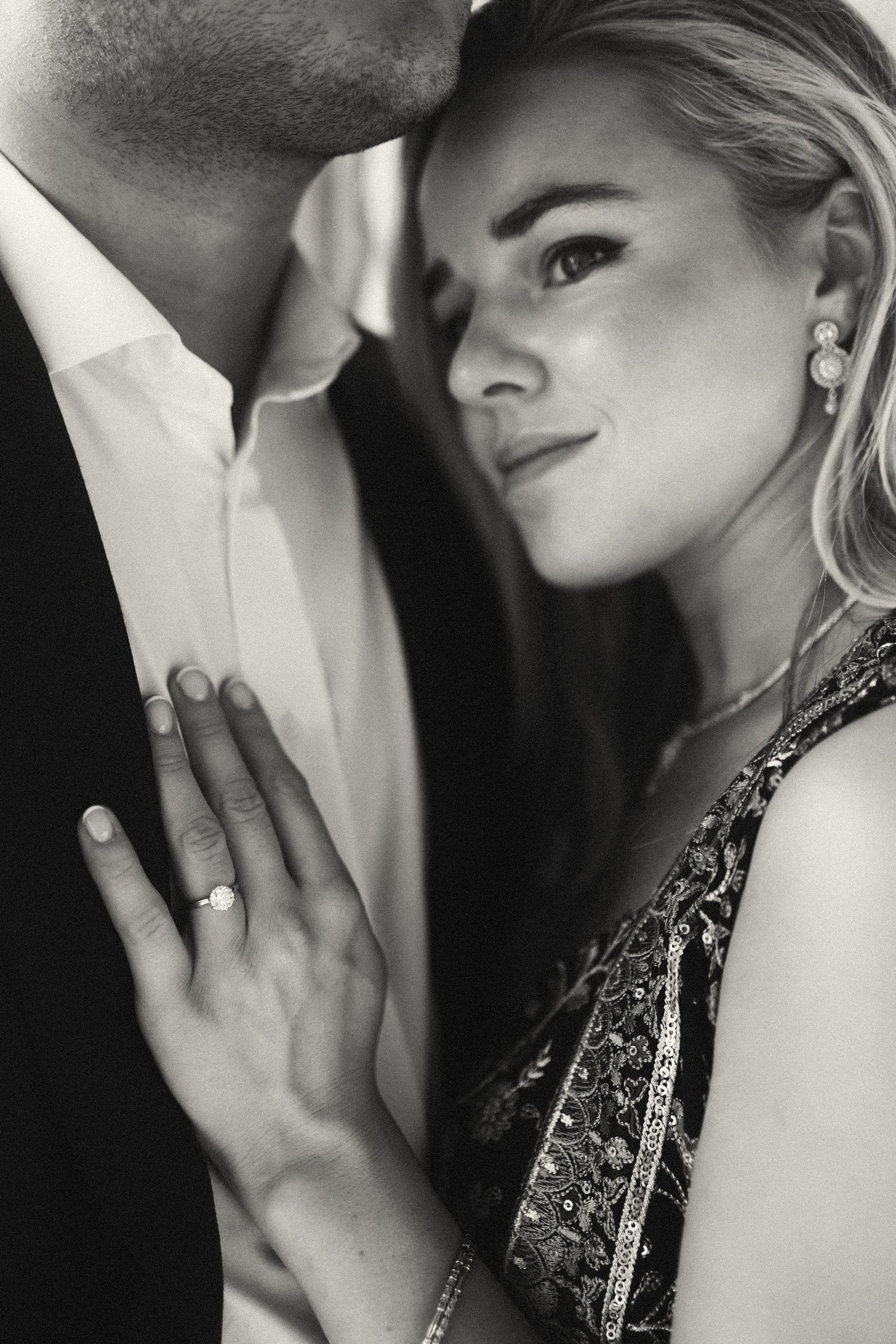 An intimate black and white portrait series capturing romantic moments between a couple.