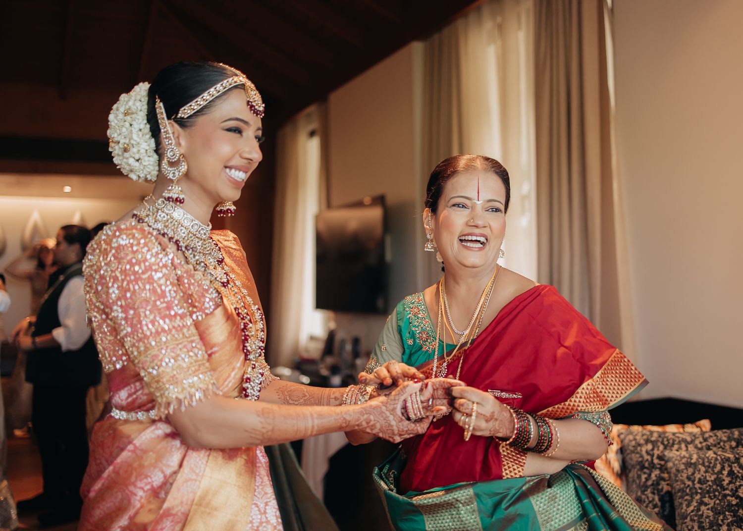 Festive wedding celebration with guests in traditional Indian attire.