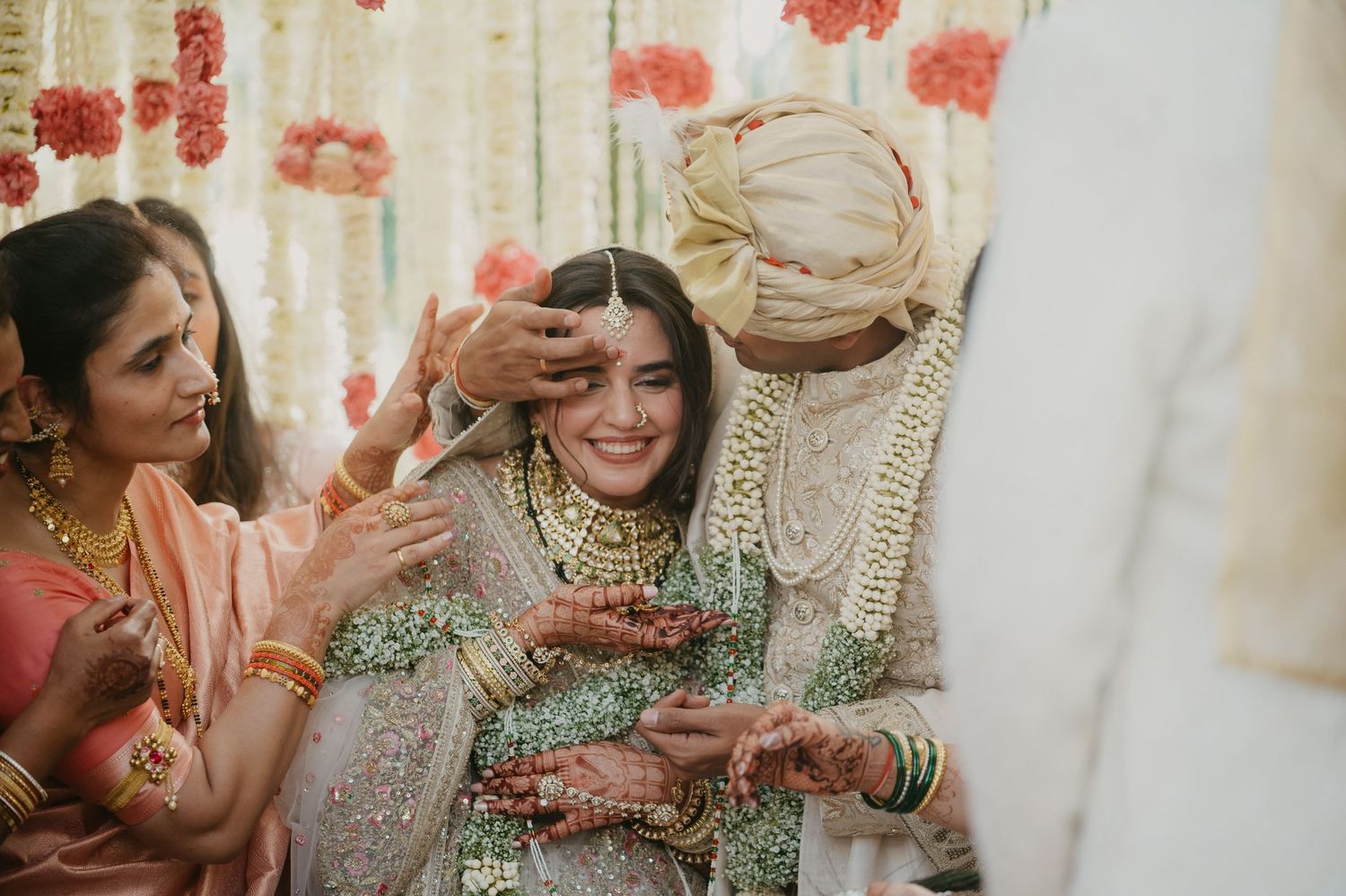 Romantic Indian wedding ceremony moments captured in a series of emotional photographs showing traditional customs and rituals.