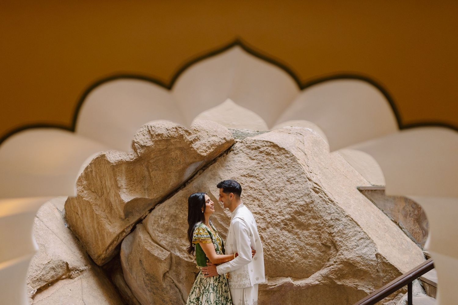 Elegant stone archways and architectural details at an Indian palace venue.