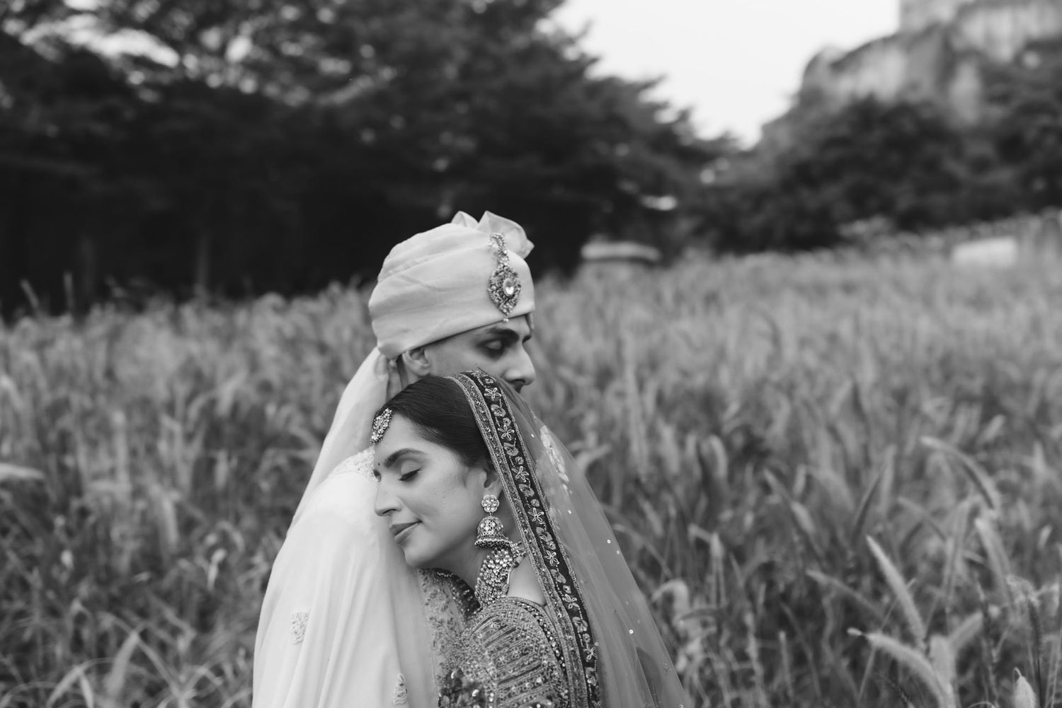 Black and white portrait series showing elegant Indian bridal details and jewelry.