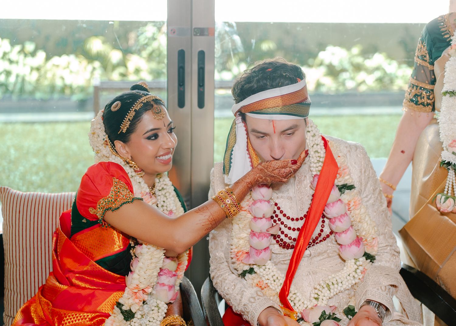 Candid wedding moments captured during an outdoor celebration.