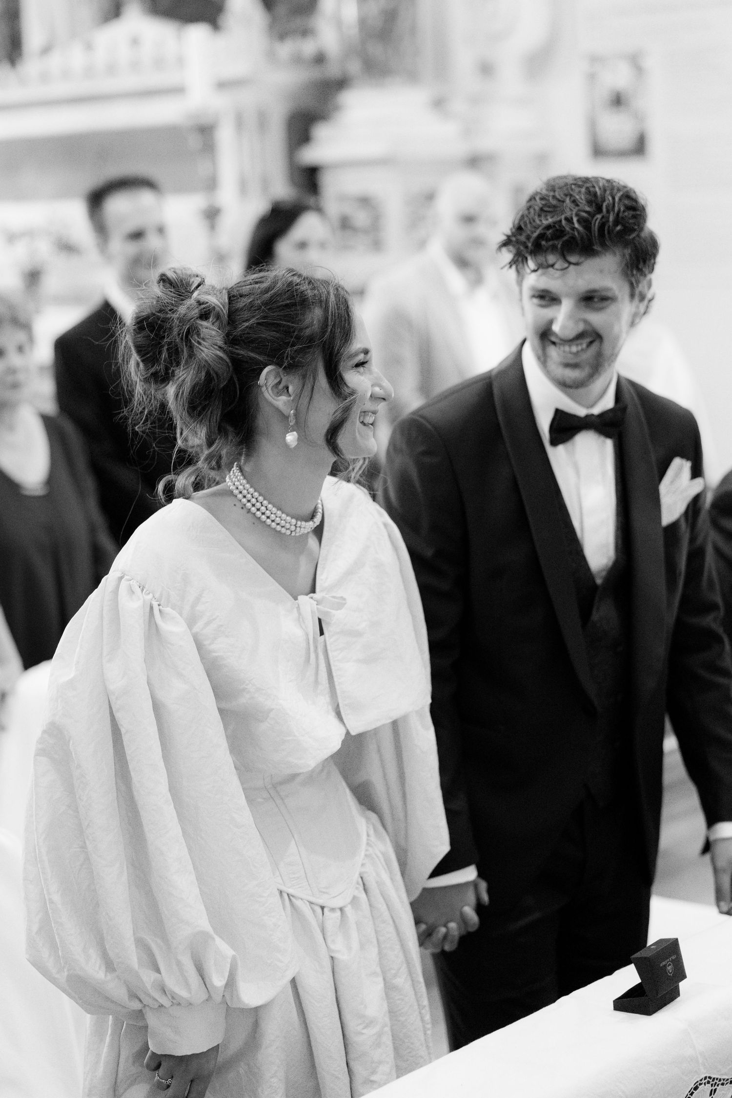 Wedding celebration sequence showing joyful moments in formal attire.