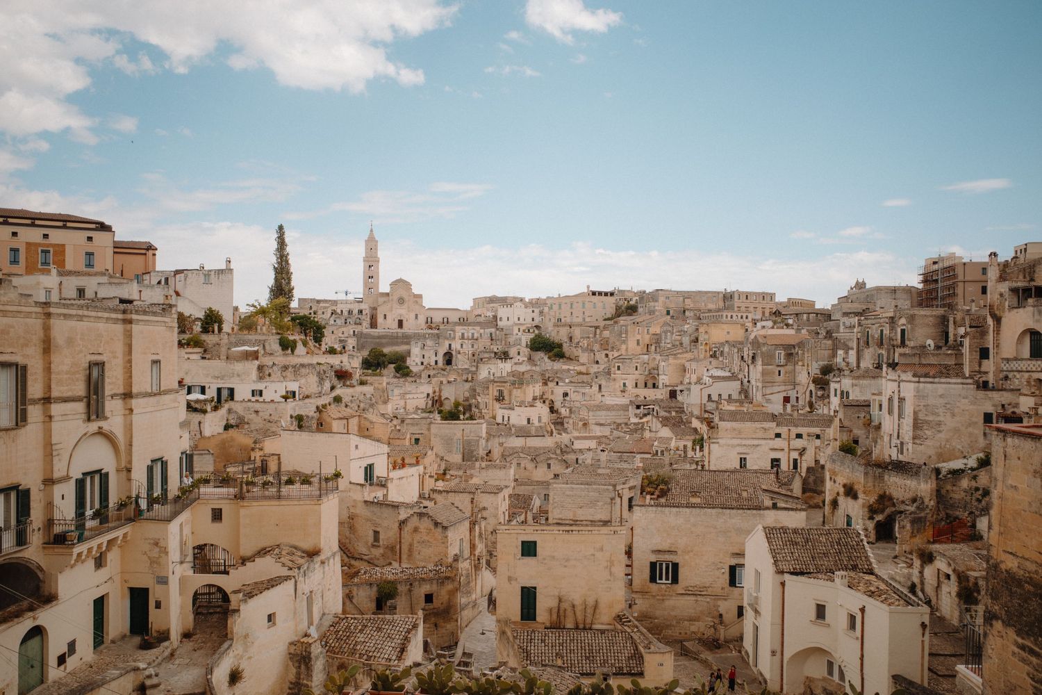 Panoramic view of ancient Matera, Italy with its distinctive stone buildings and churches.