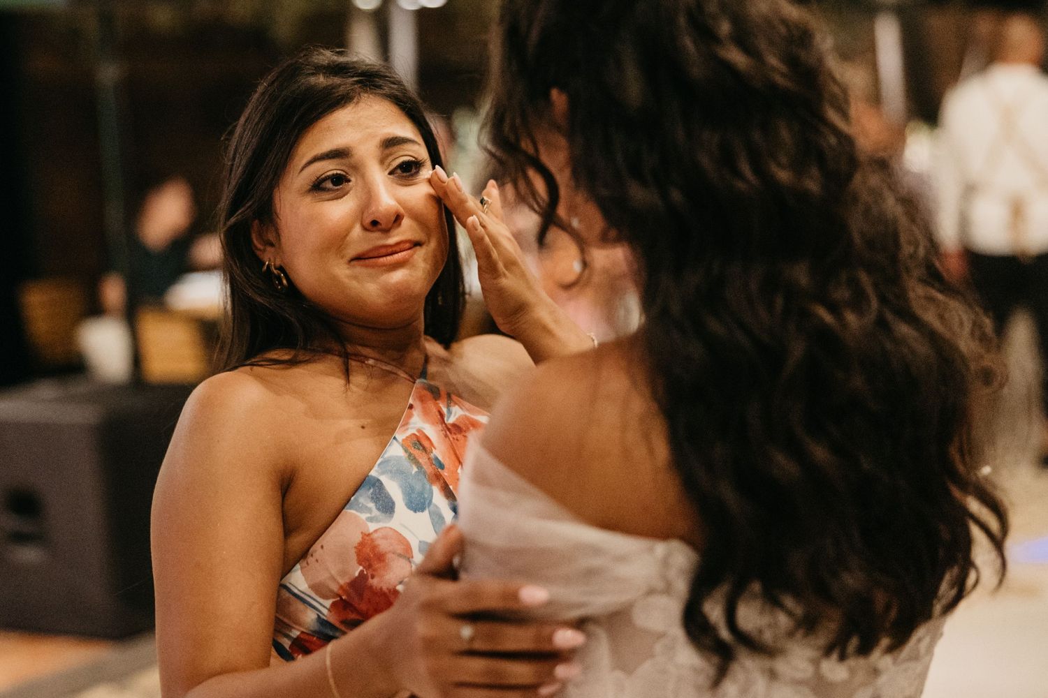 Intimate indoor celebration moments captured in warm lighting.
