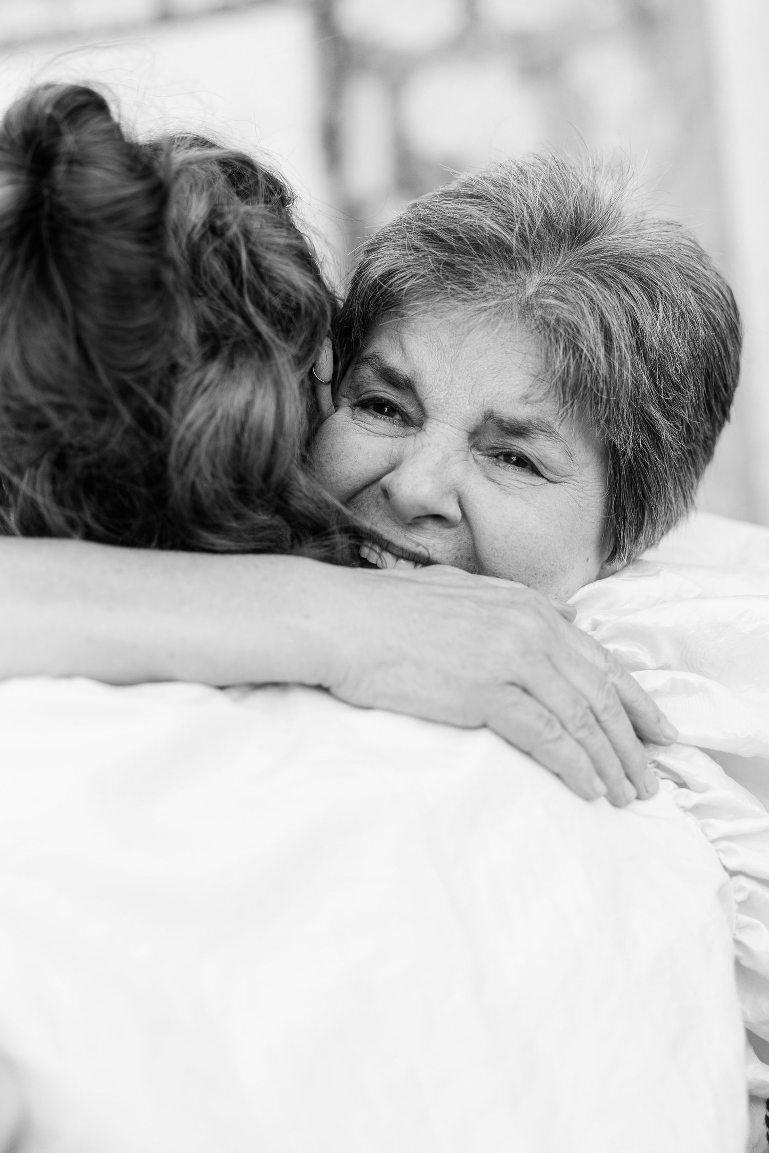 Intimate black and white photo sequence showing tender moments of rest.