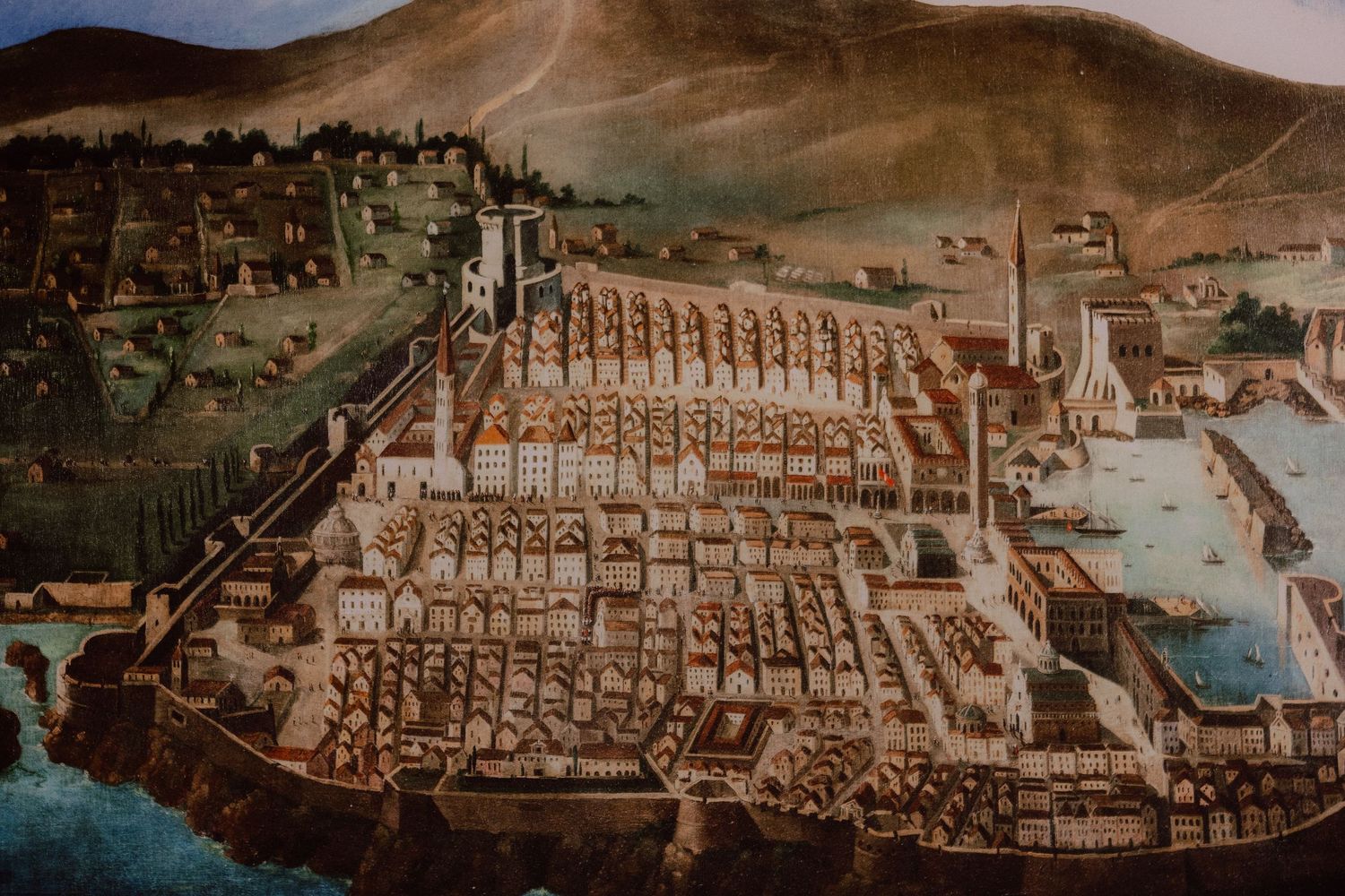 Historical panoramic painting of a coastal city with mountains and fortifications  in Dubrovnik, Croatia.