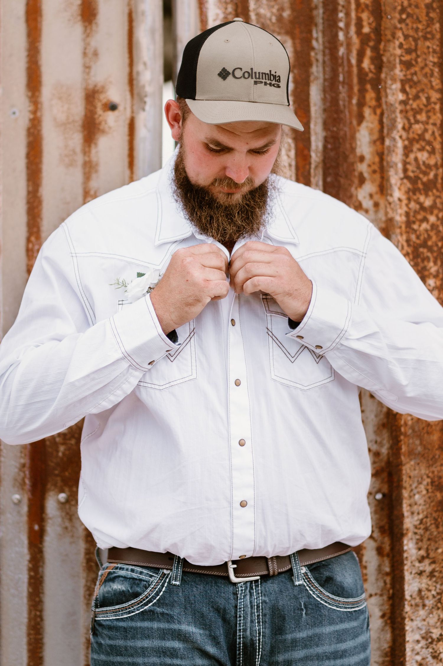 Series of casual photos showing person adjusting white button-down shirt collar.