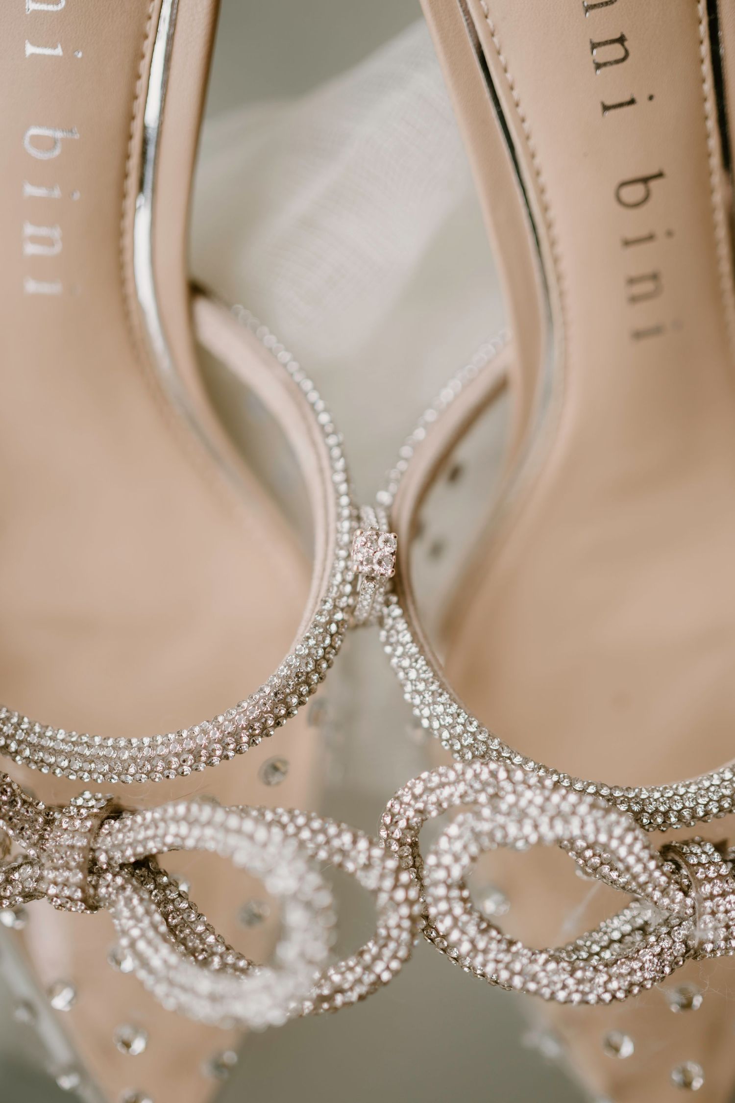 Elegant bridal shoes with intricate crystal embellishments and delicate beading details.