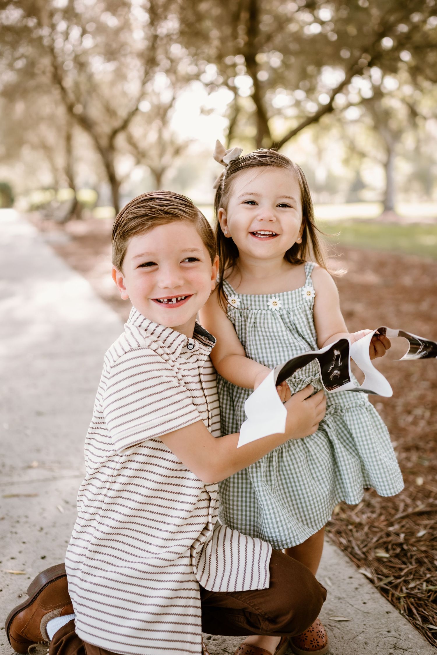 Playful outdoor portrait series of children sharing joyful moments together.