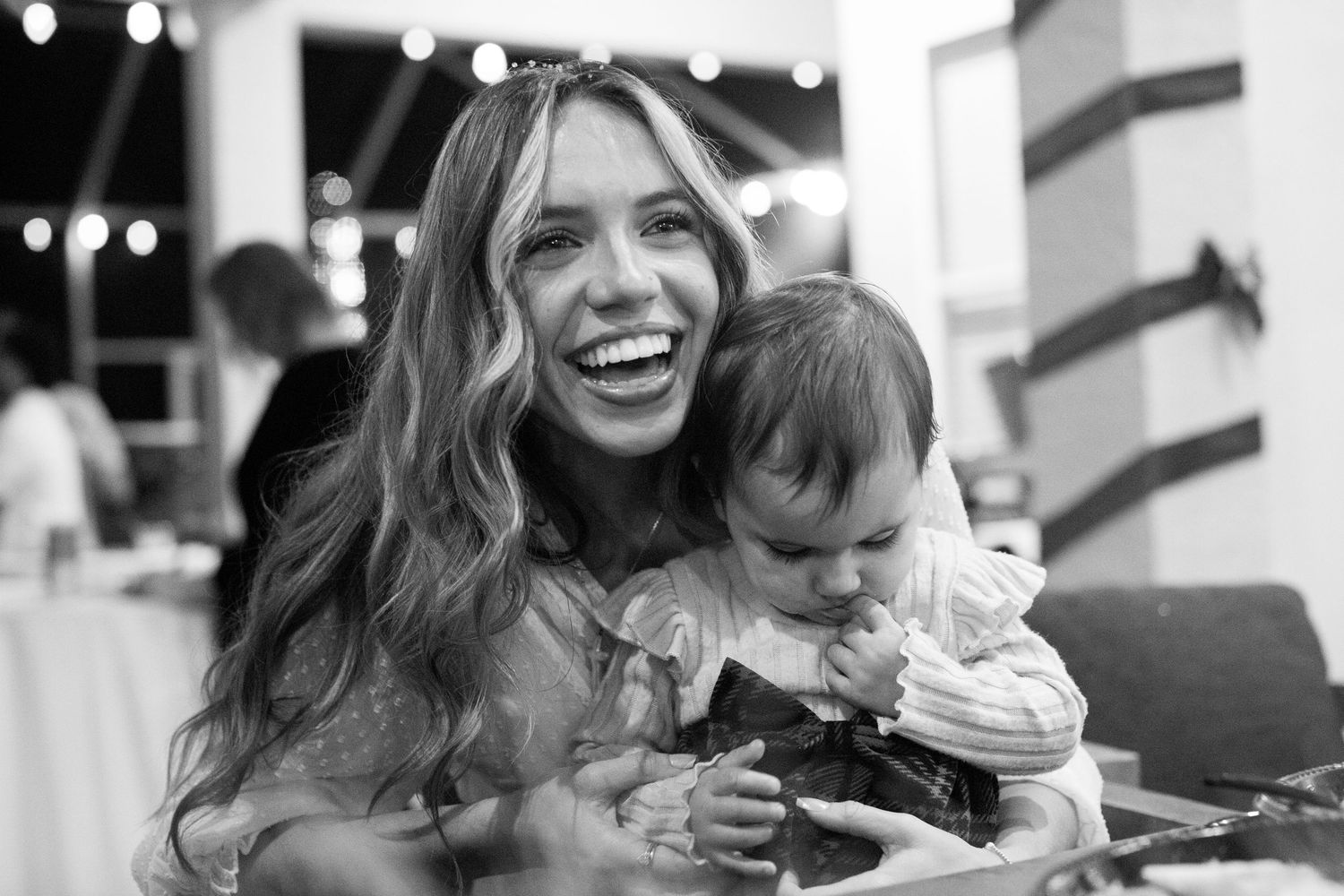 Candid moments of laughter and joy captured during a social event.
