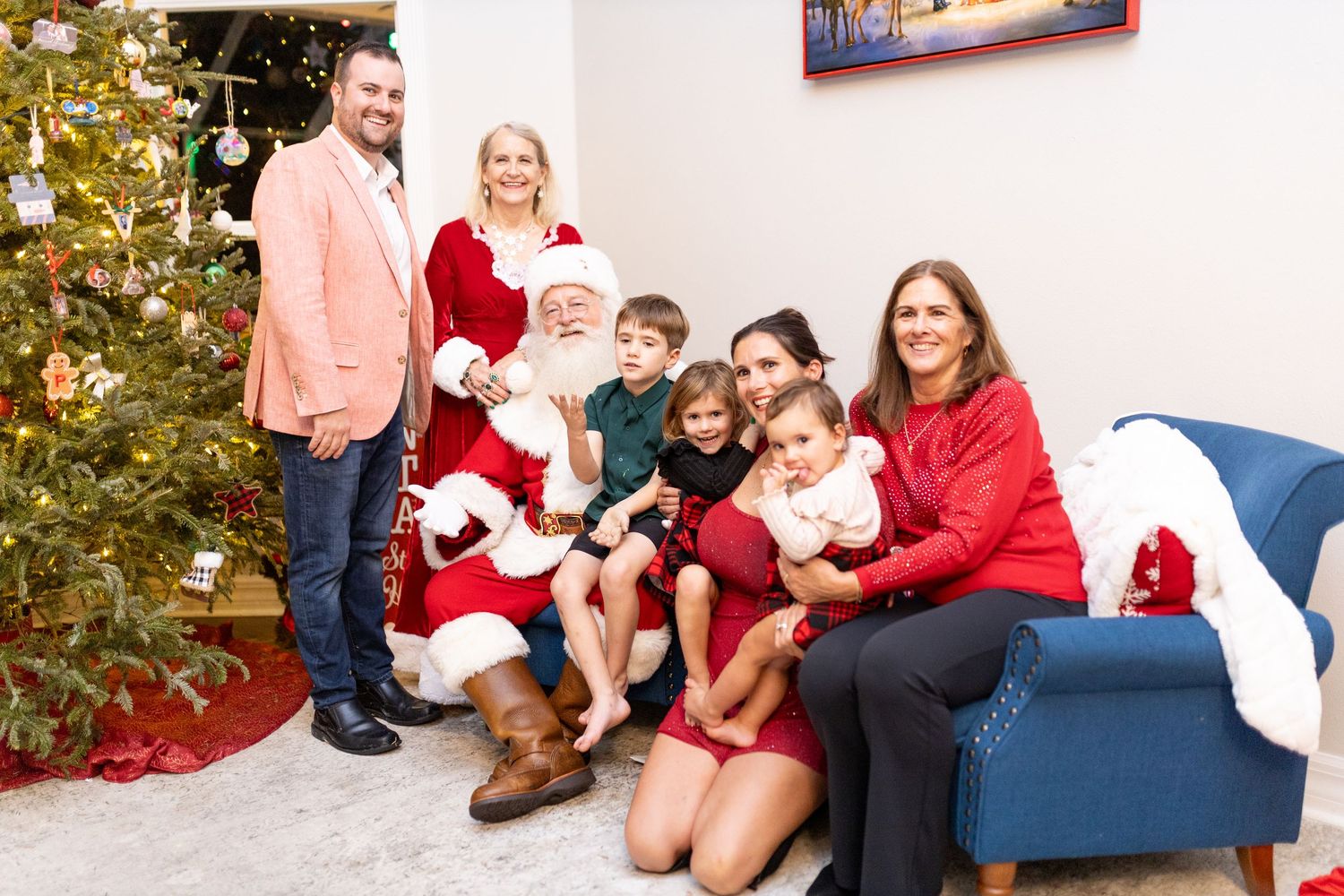 Holiday portrait series showing different poses with Santa Claus and Christmas decorations.