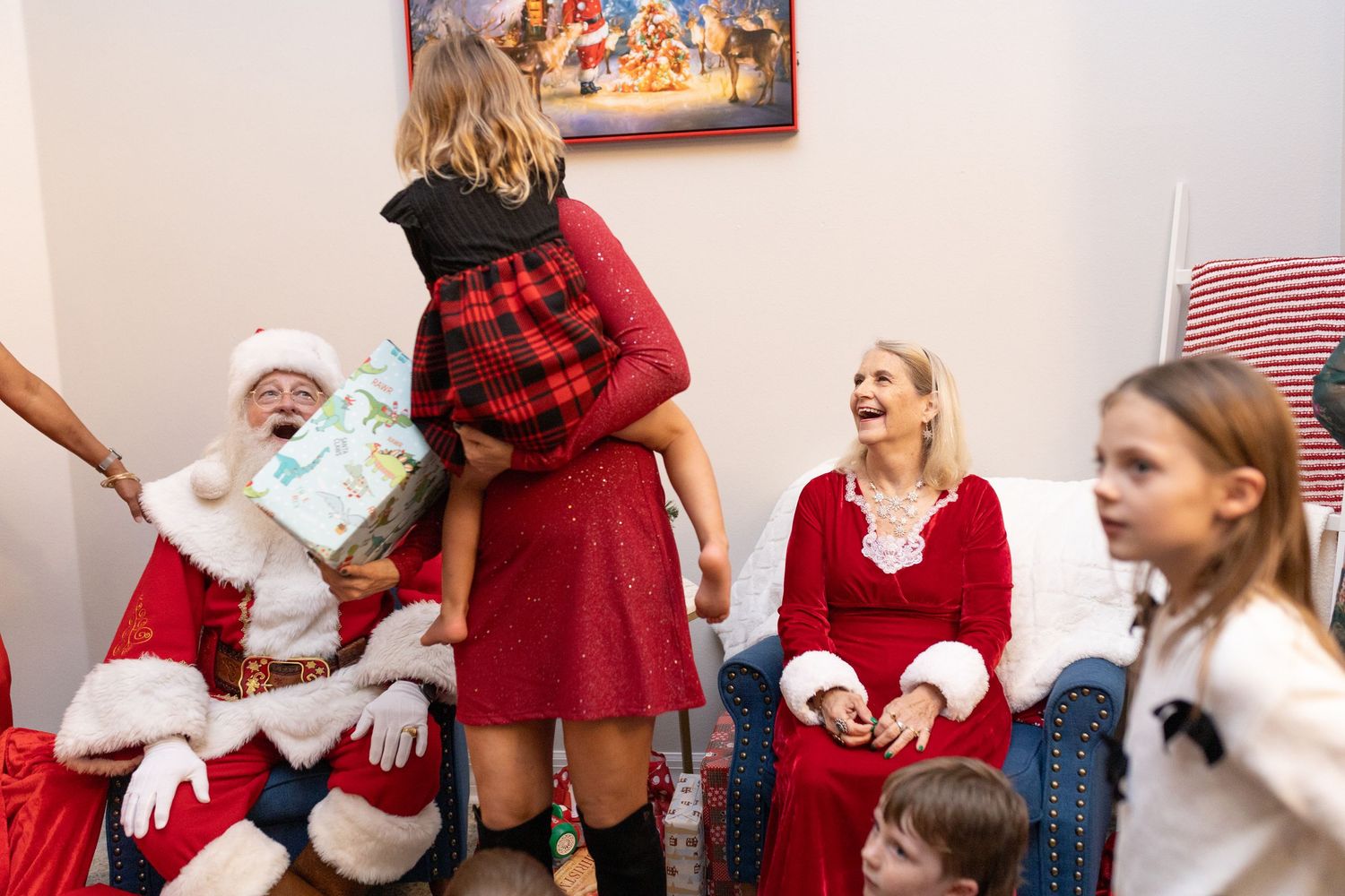 Holiday celebration scene with wrapped presents and festive decorations.
