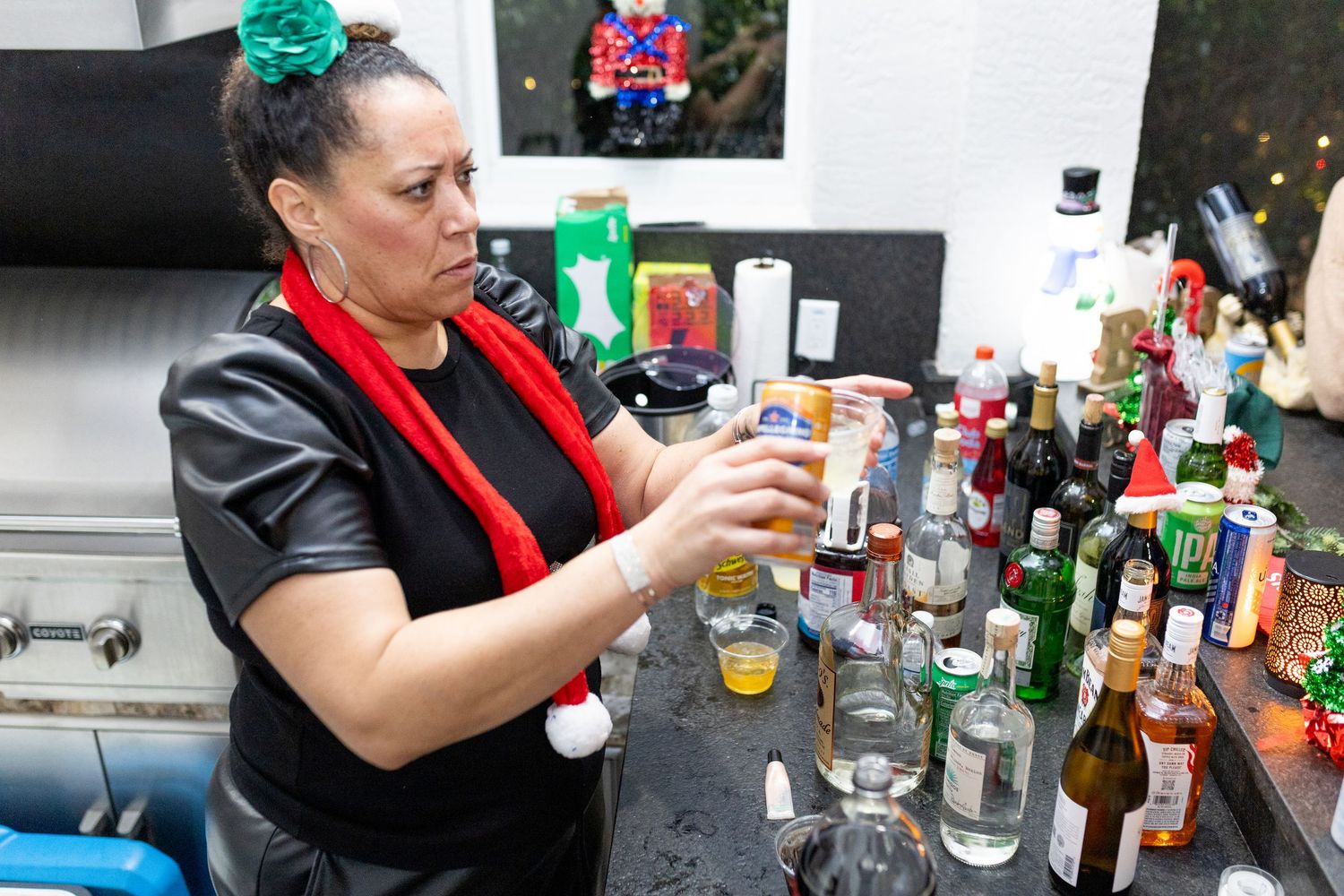 A bar setup with various bottles and beverages for a party or event.