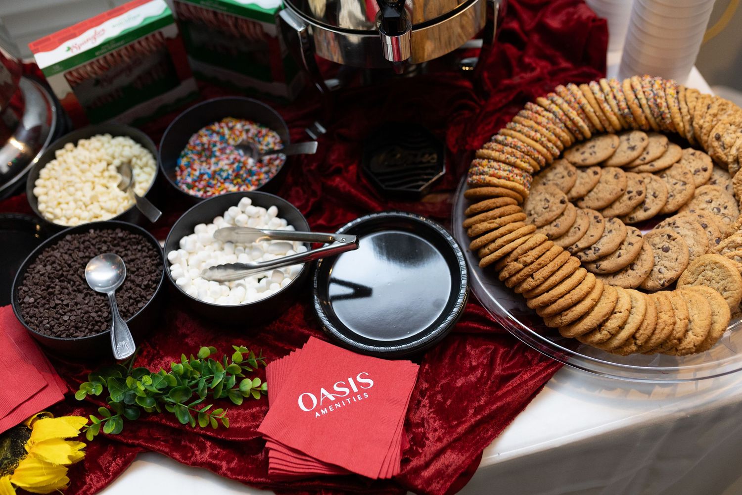 Dessert table featuring cookies, dips and festive holiday treats.