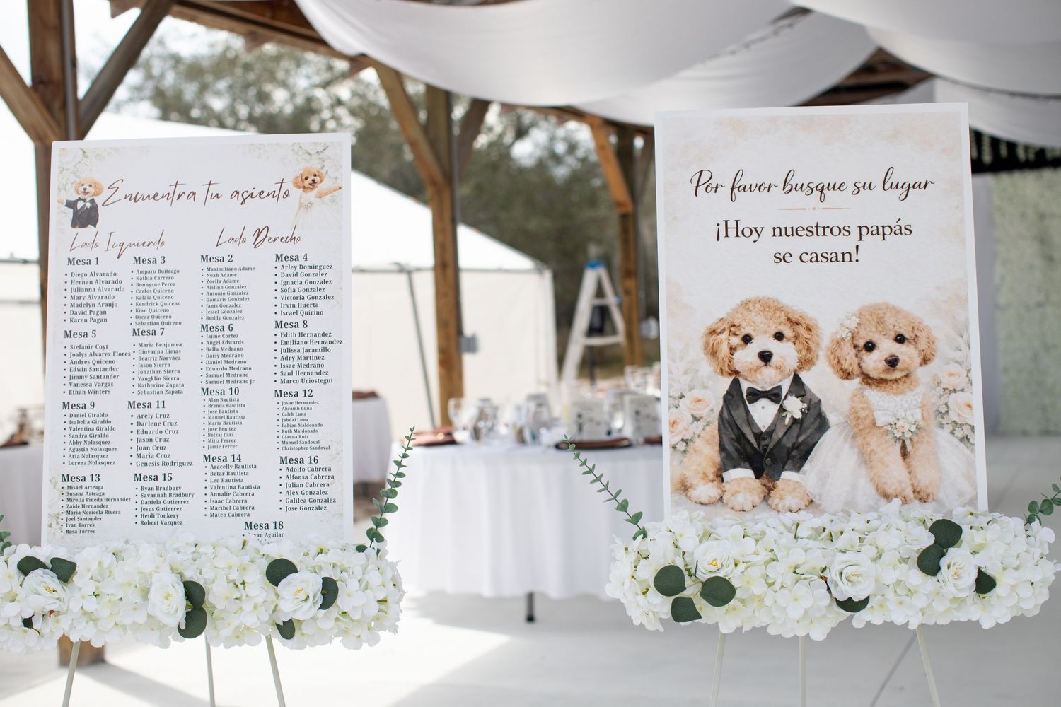 Wedding seating chart display with floral arrangements and adorable puppy illustration signs at an elegant outdoor reception.