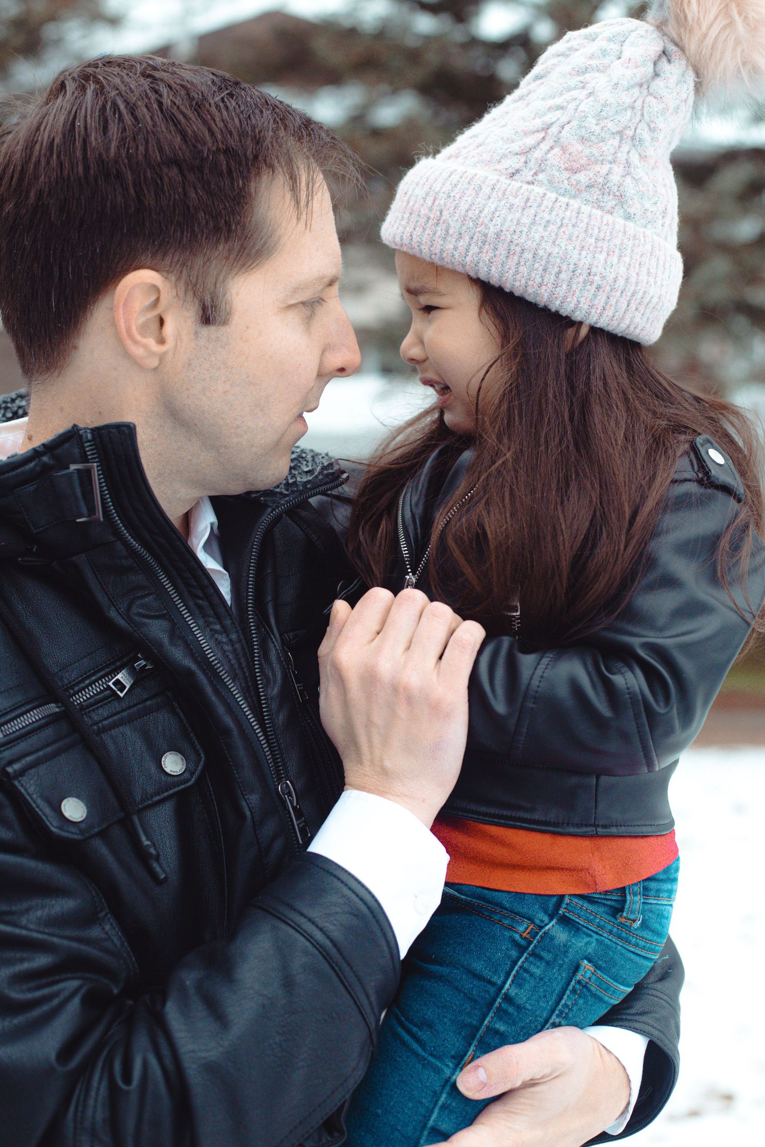 Father and child sharing a quiet moment during a family photography session  in Ottawa