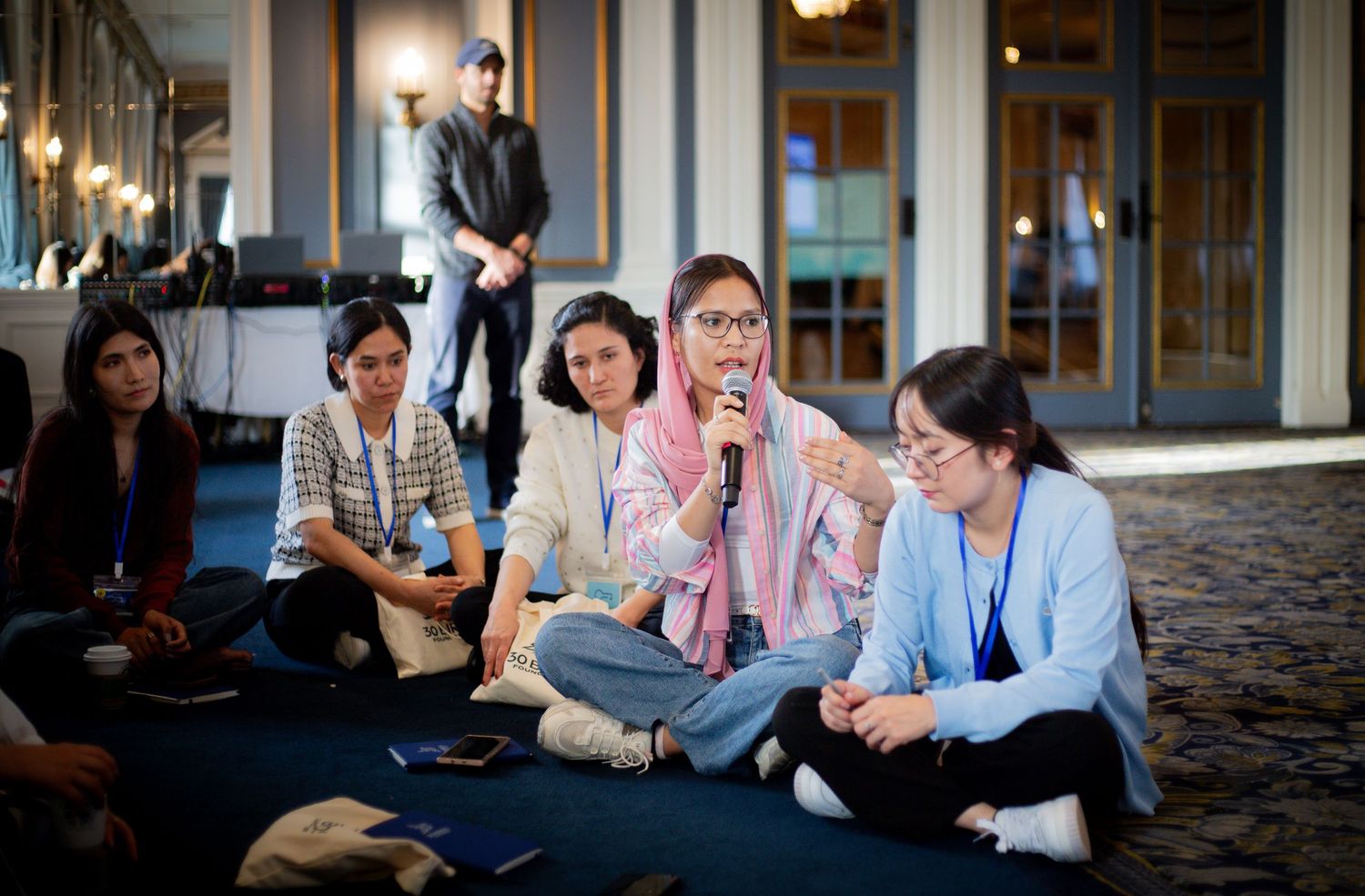 Youth participant speaking during a nonprofit event photography session in Ottawa