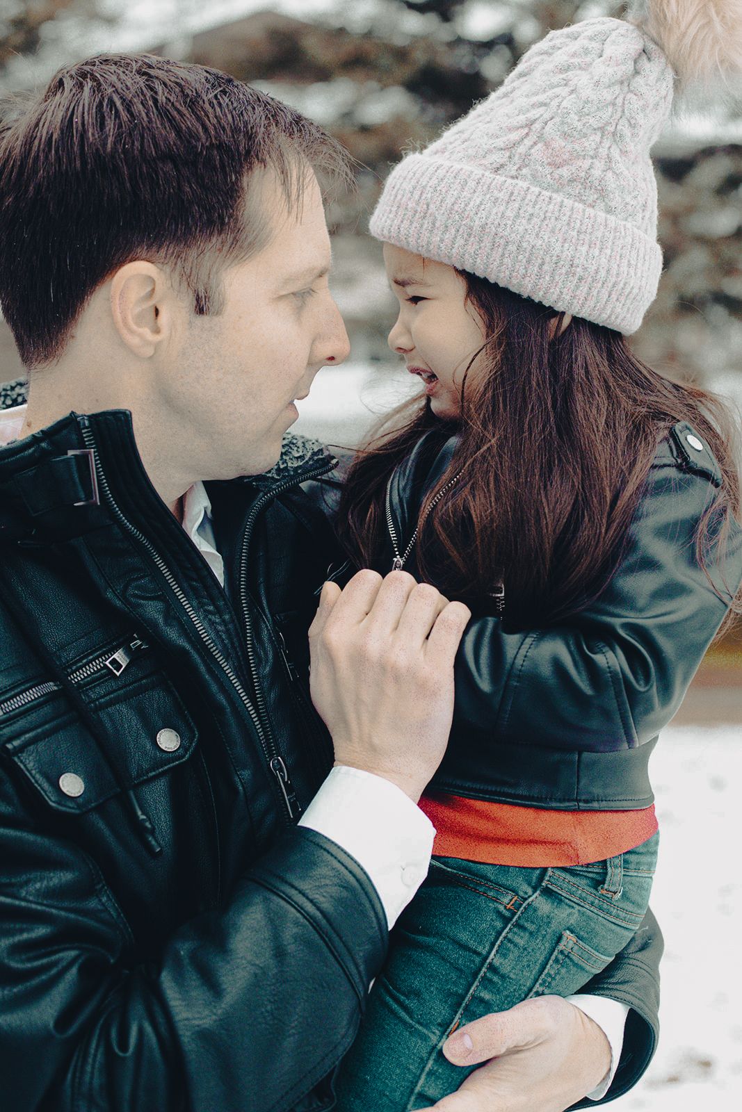 Father and child sharing a quiet moment during a family photography session  in Ottawa