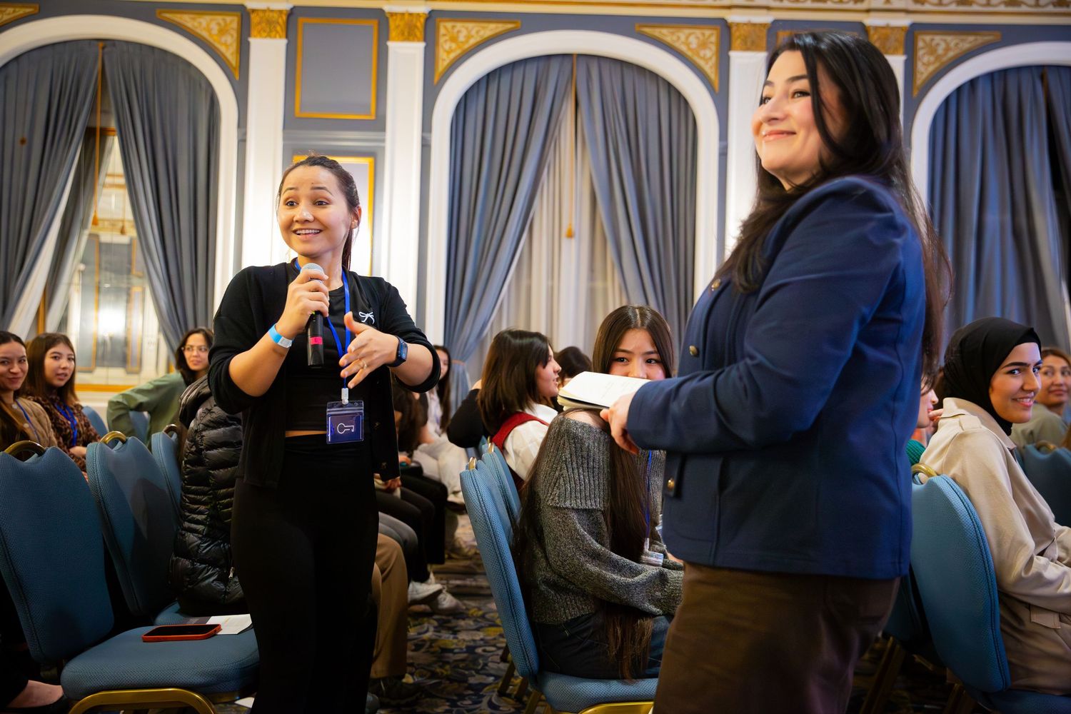 Speaker engaging with attendees during a nonprofit event photography session in Ottawa