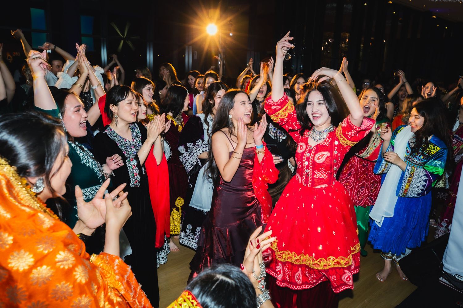 Guests dancing during a cultural event photographed for an organization in Ottawa