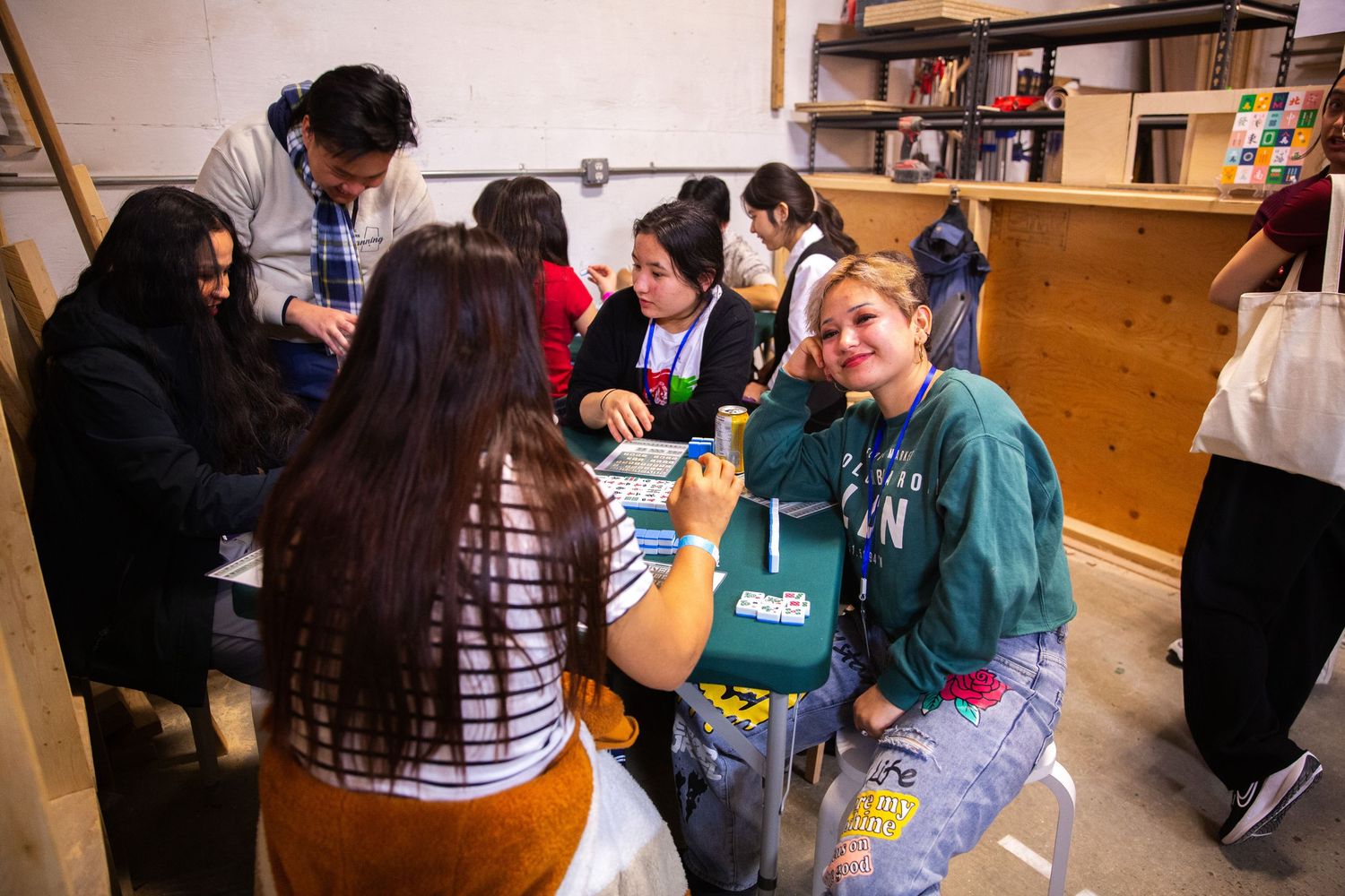 Youth participants gathered around a table during an organizational event in Ottawa