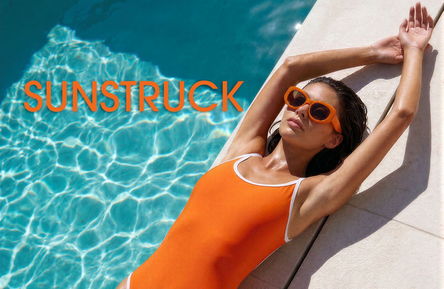 Woman in orange swimsuit and sunglasses relaxing by a pool with SUNSTRUCK text overlay.