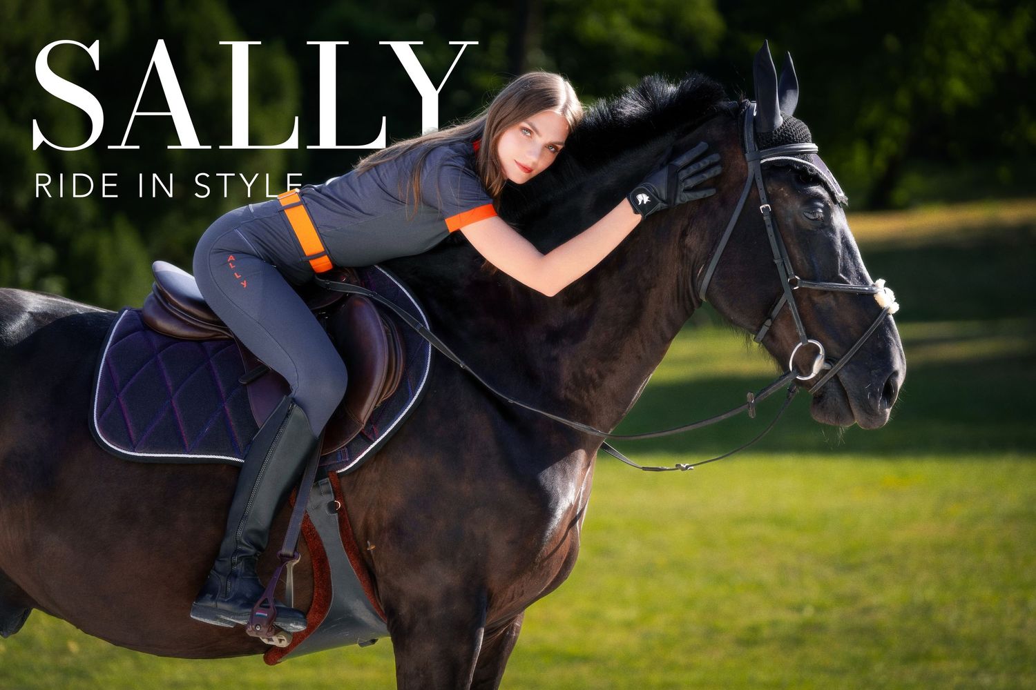 A rider in gray and orange equestrian attire affectionately hugs a dark horse outdoors for Sally Ride In Style.